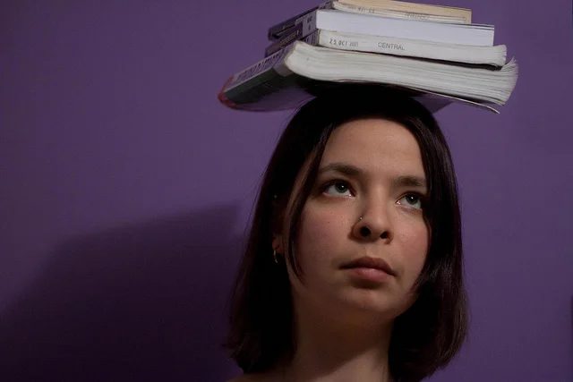 Studying and working was a balancing act for Jo (this isn't her by the way, just someone with a balanced head! ) Image by Judit Klein