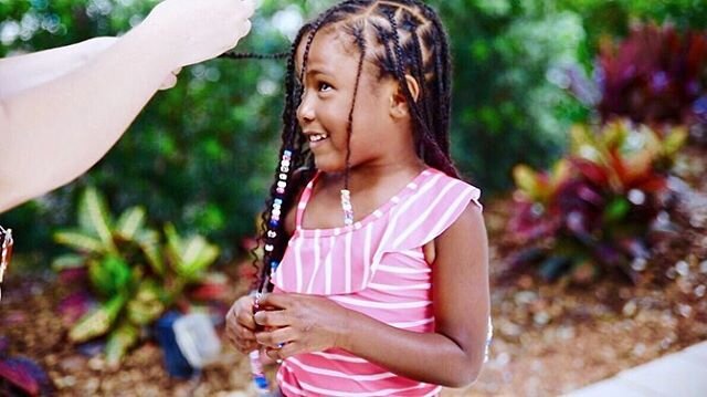 the first time this beautiful little curly girl had her hair braided and beaded and she loved it!!! she got to select her colors and choose each of their patterns making for such a sweet memory that i won&rsquo;t soon forget with my girl. after she w