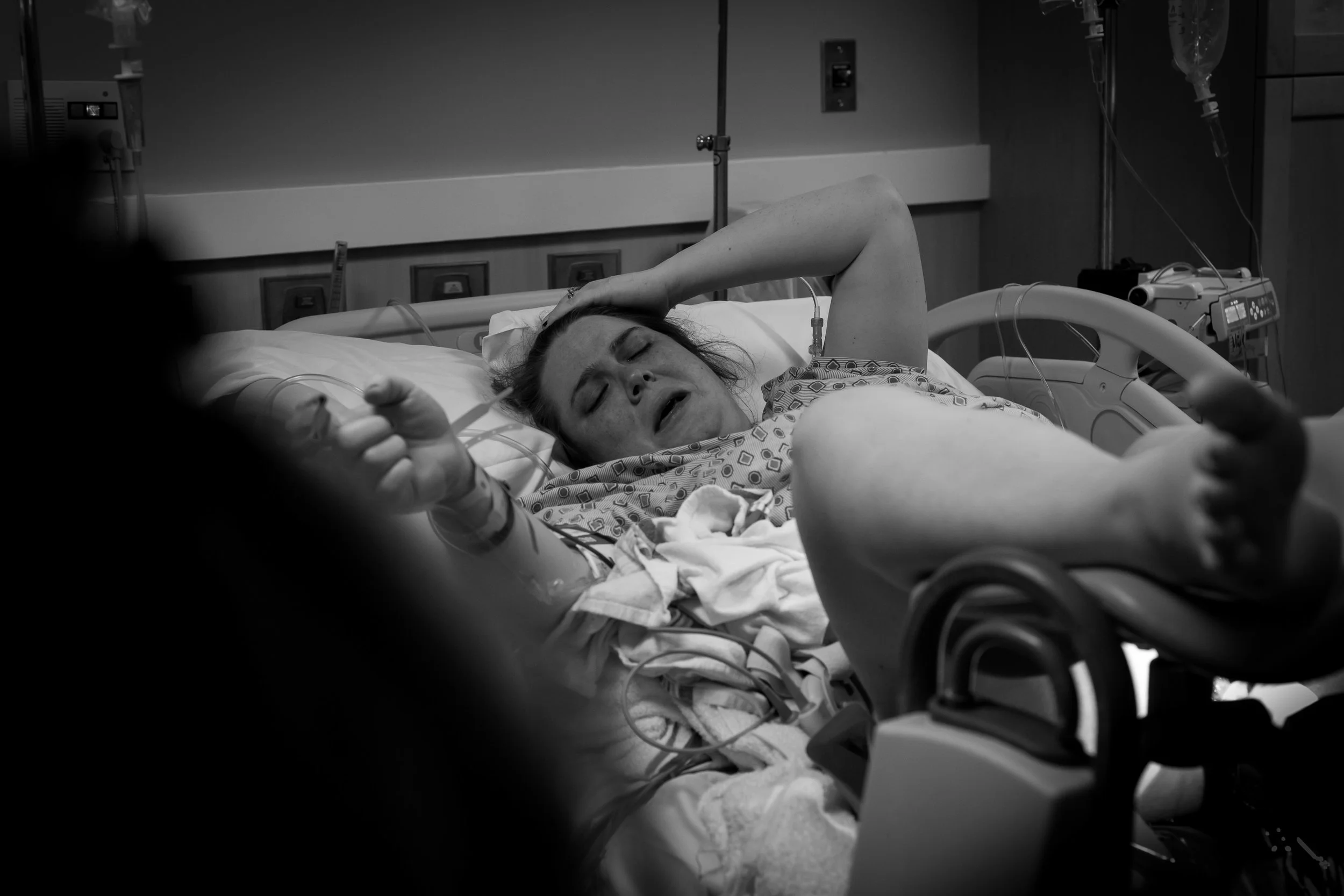 Still in the stirrups, this was the first moment that Caity saw our daughter (and that's a happy cry)!