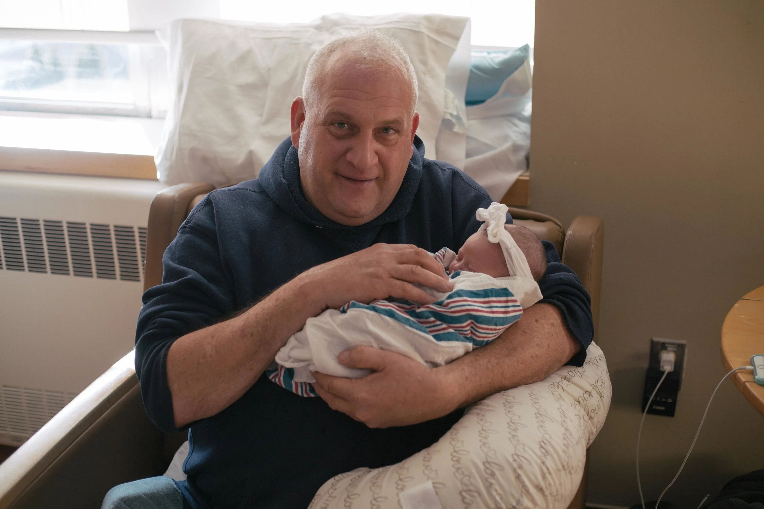 The grandparents meeting Charlee for the first time!