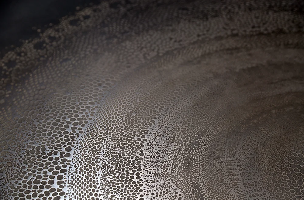 The possibilities of 3D printing on any material are endless. A detail of a Nickel printed pattern by Axolotl.