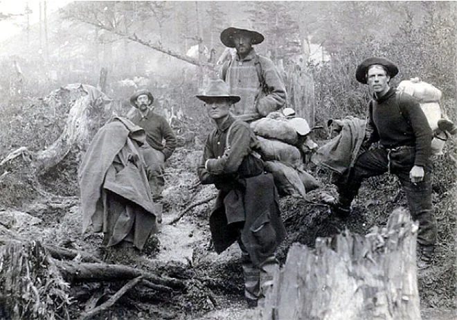 A few terrifying dudes, in Filson gear.