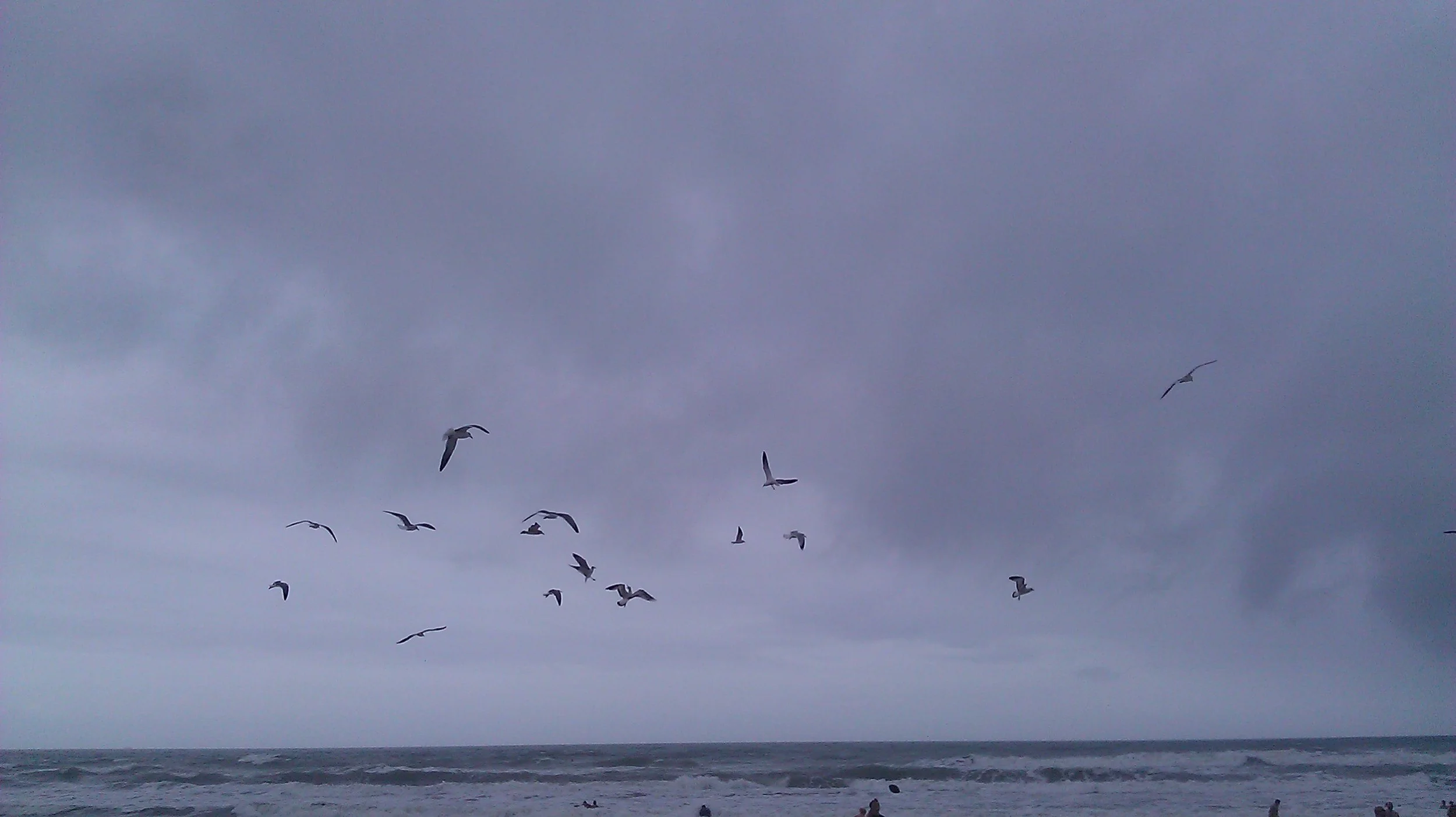 The ominous clouds didn't stop us from dipping our toes in the turquoise waters.