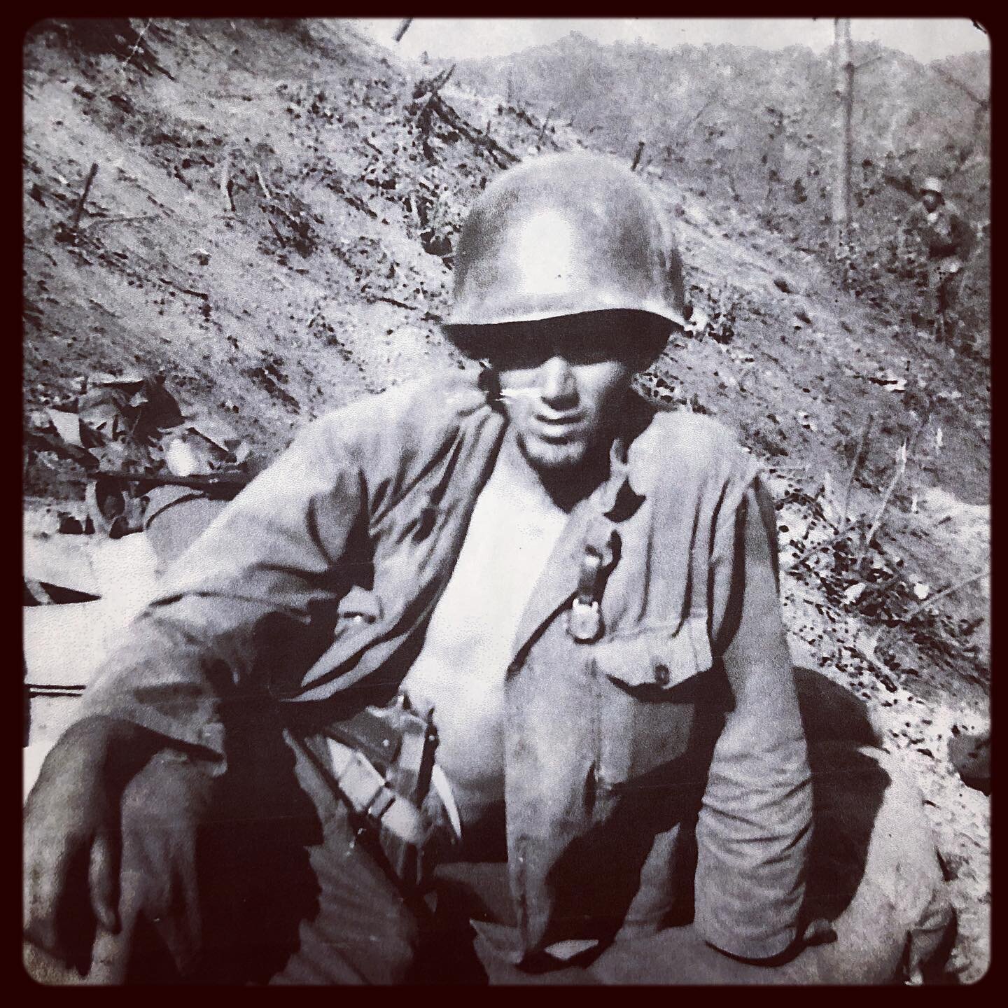Remembering my late grandfather John Davis on Veteran&rsquo;s Day. Seen here sitting on a blown up hillside after fighting a 10 day battle in the Korean War. He told me a story about a time a bullet struck the brim of his helmet, spinning it around o