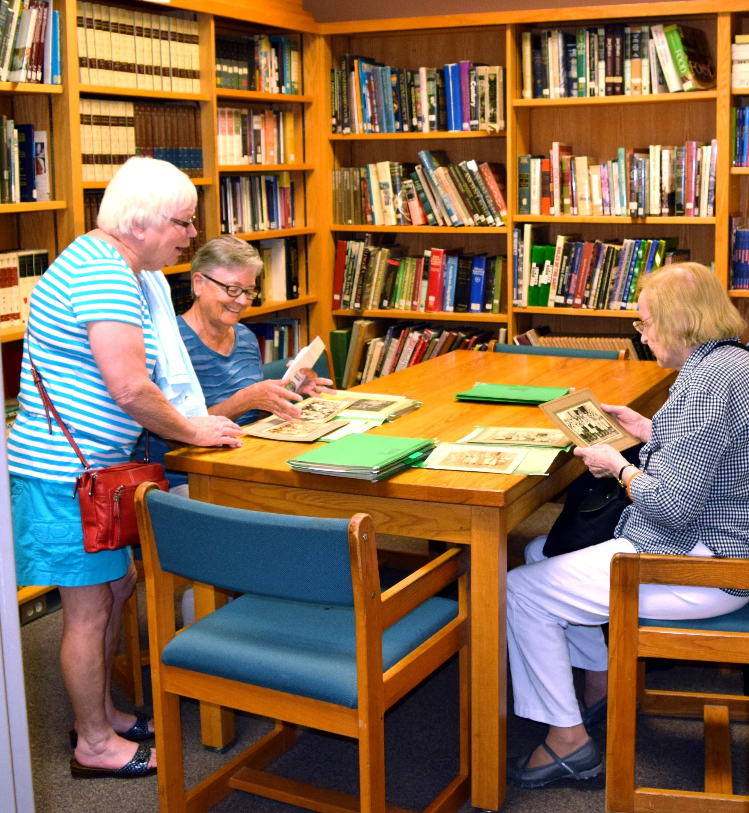 Alums enjoyed looking at the historical school display in the school library