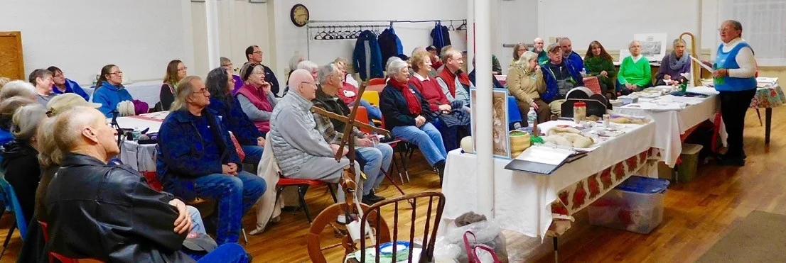 Dori Hamilton presented a wonderful program, "Sheep to Shawl" after the Society's Annual Meeting on January 18, 2017. There was a full house at the meeting space in the Shared Ministry's White Church in Lisbon. Dori's spinning wheel is pictured center right. Those present enjoyed a demonstration of the process of carding and spinning wool.. There was also a table of information about sheep and sheep farming, tools of the trade, photographs, and beautiful items made by Dori and her friends from her sheep's wool.