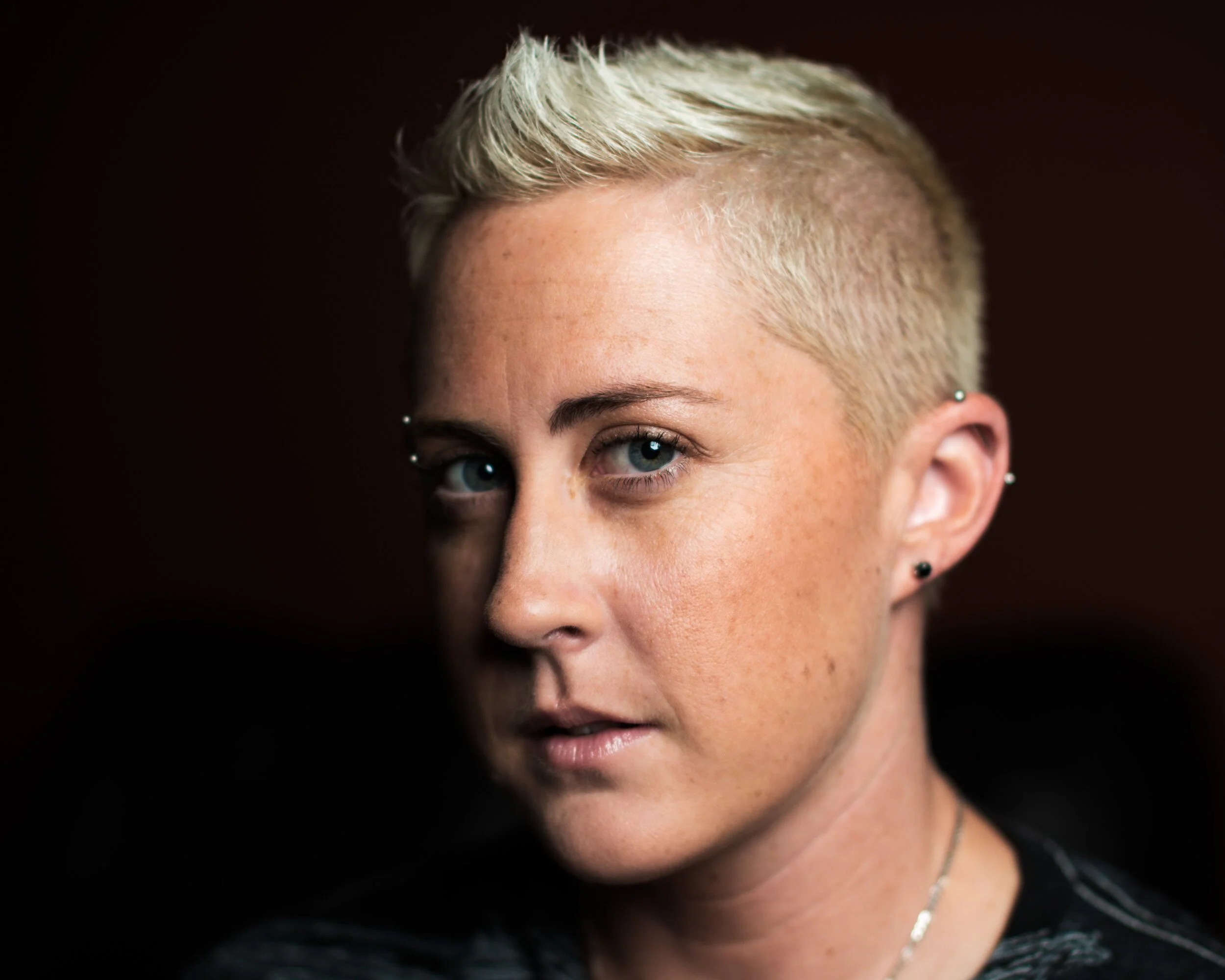 dramatic-portrait-woman-platinum-undercut.jpg