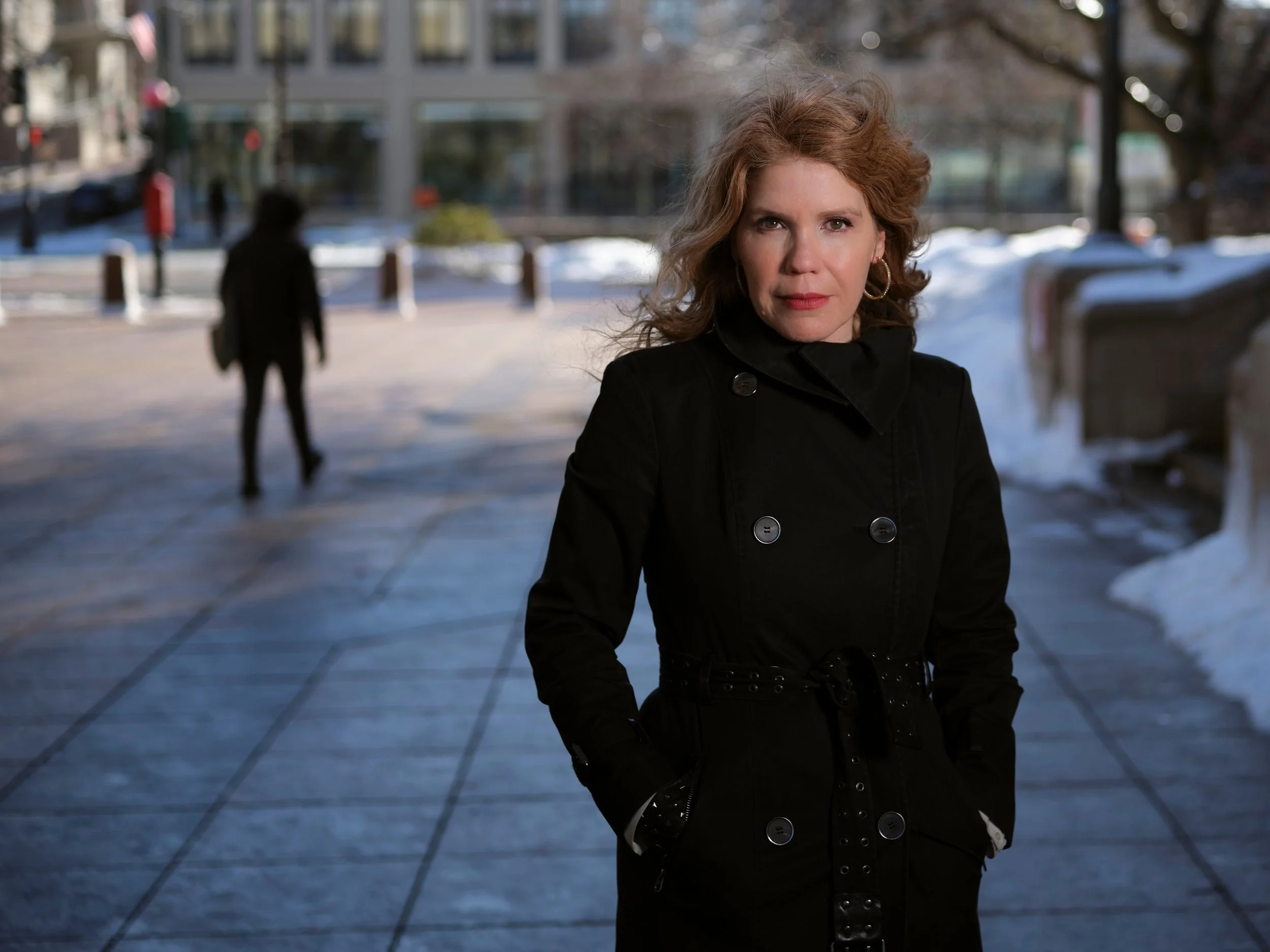 on-location-portrait-woman-black-coat-winter-city.jpg