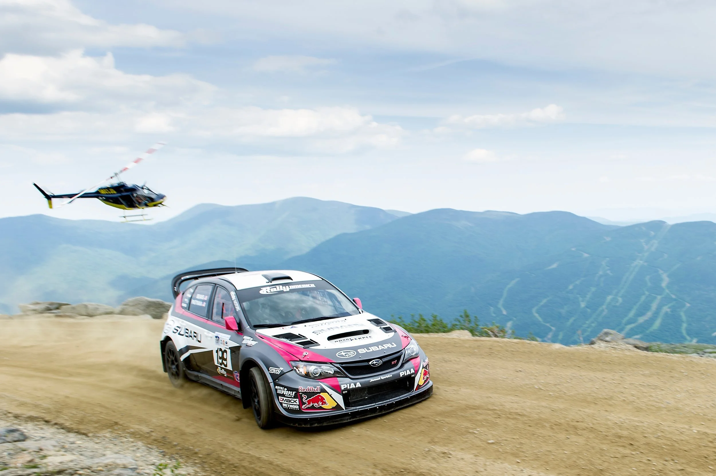 subaru-rally-car-mountain-summit-helicopter.jpg