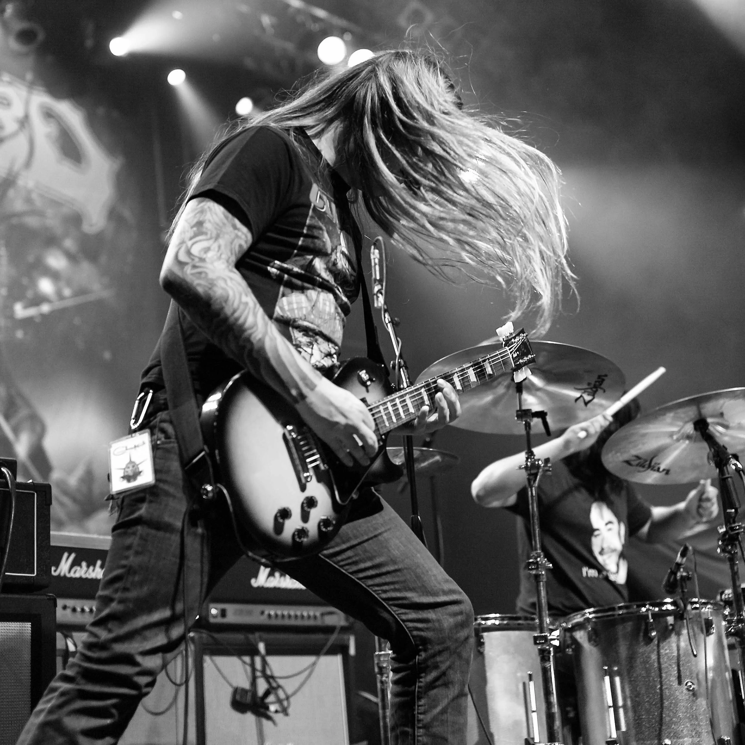 concert-photography-guitarist-hair-flying.jpg