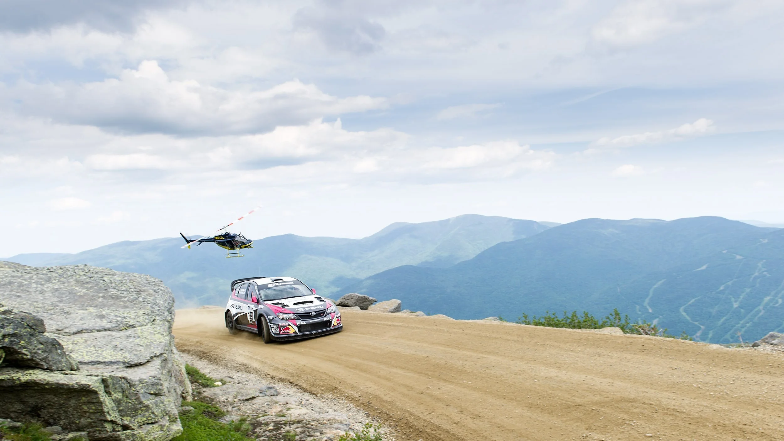 rally-car-mountaintop-road-helicopter.jpg