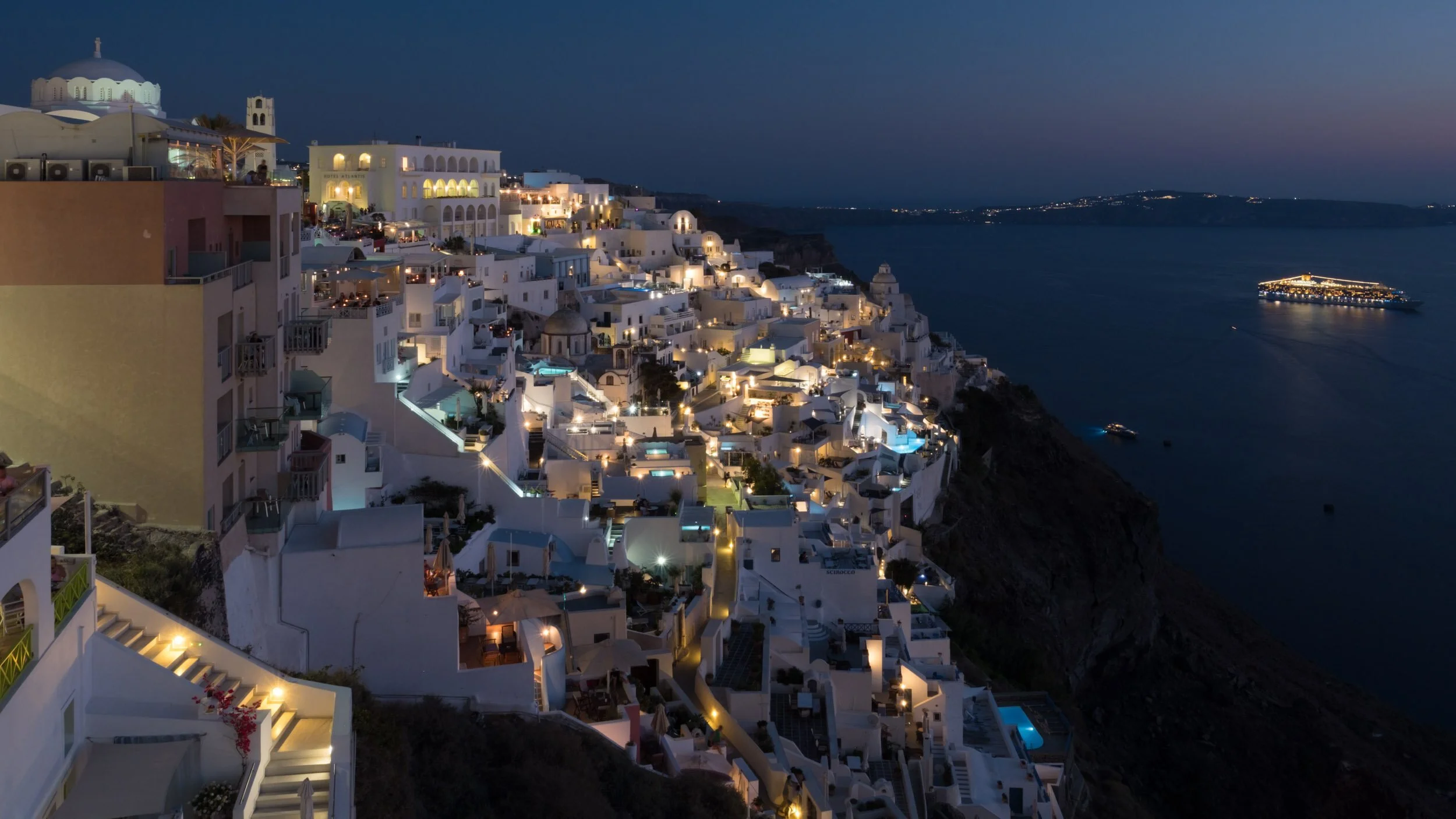santorini-greece-whitewashed-cliffside-town-at-dusk.jpg