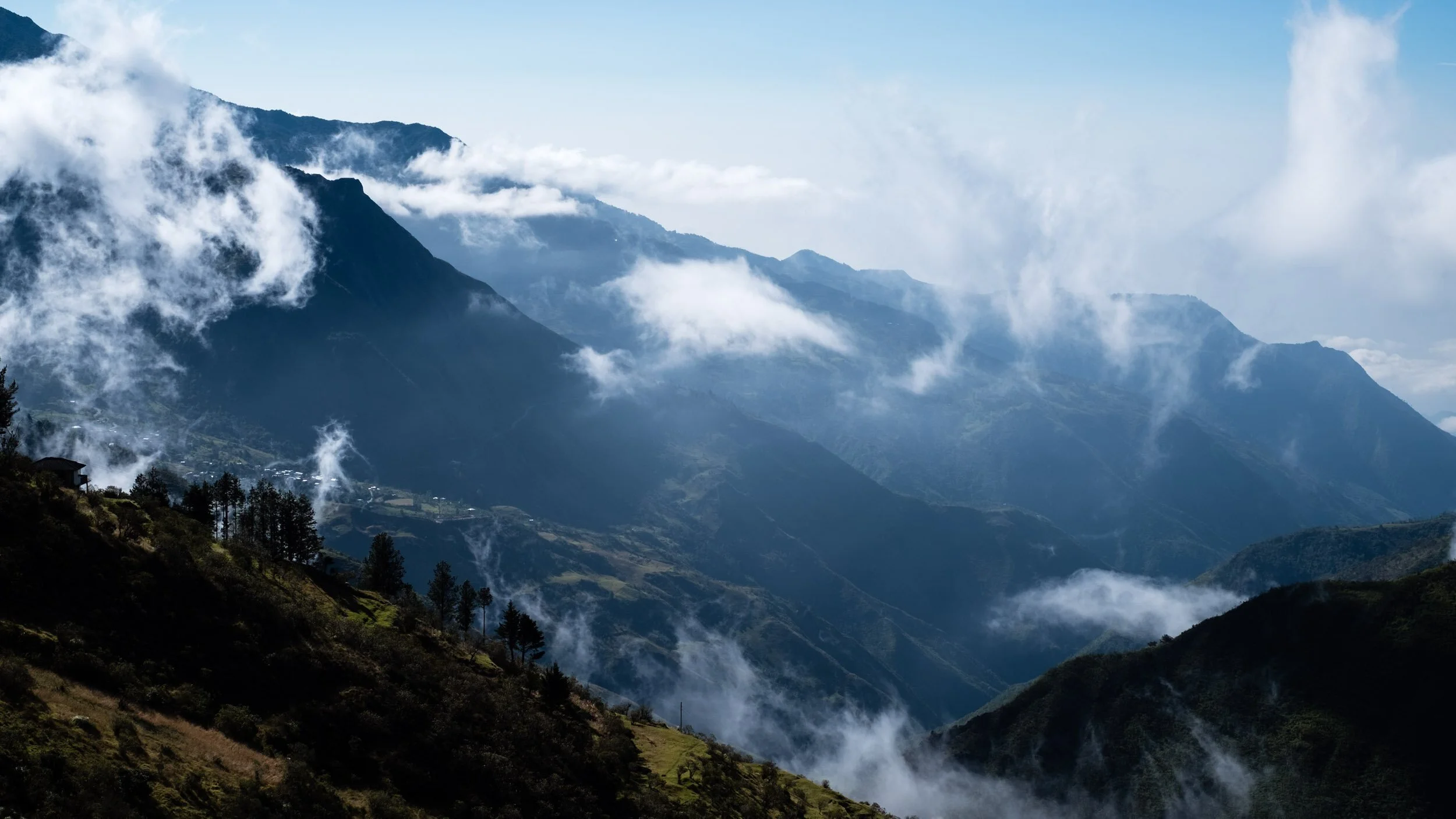 misty-mountain-valley-clouds-andes-ecuador.jpg
