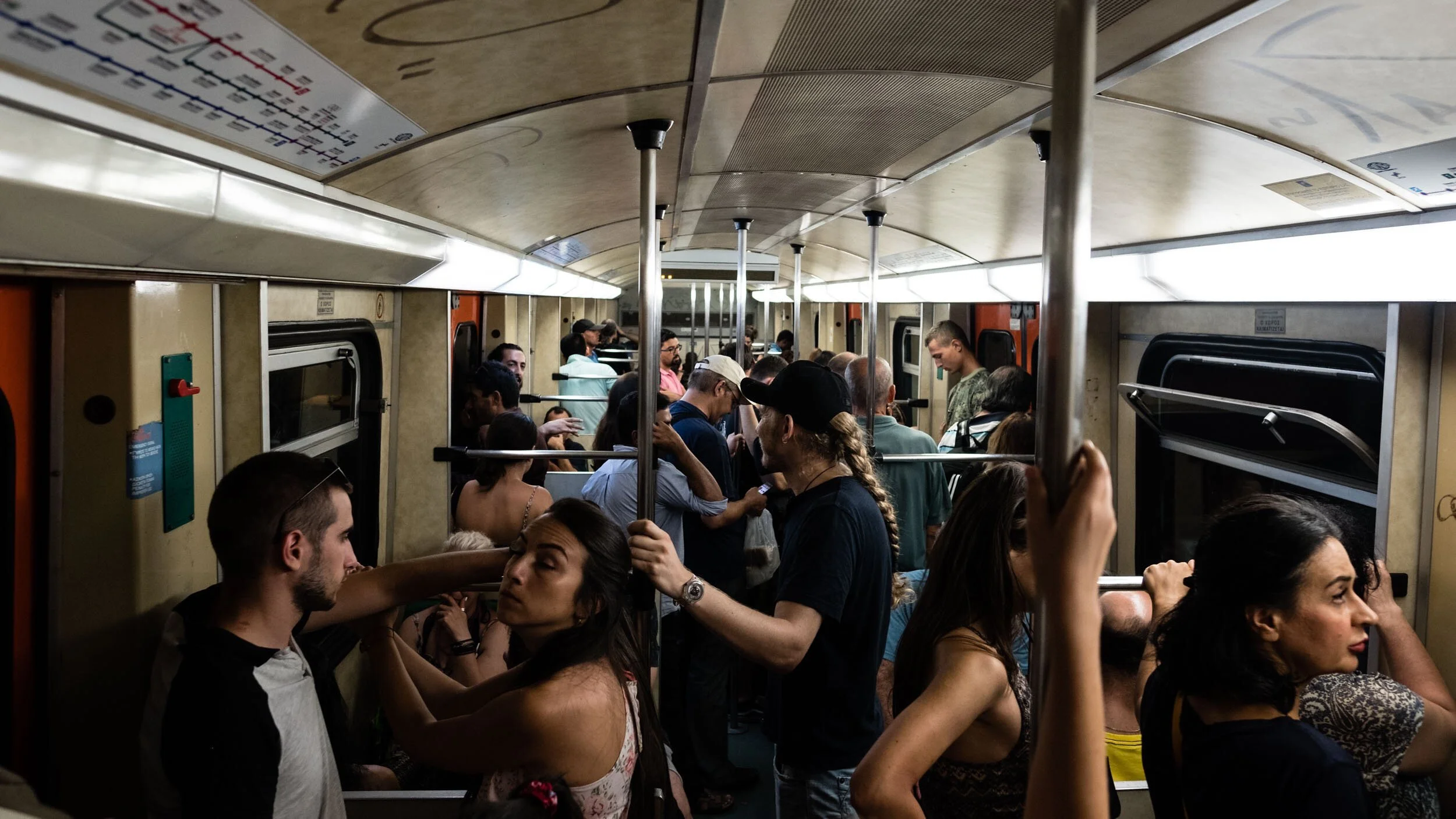 athens-greece-crowded-metro-car-commuters.jpg