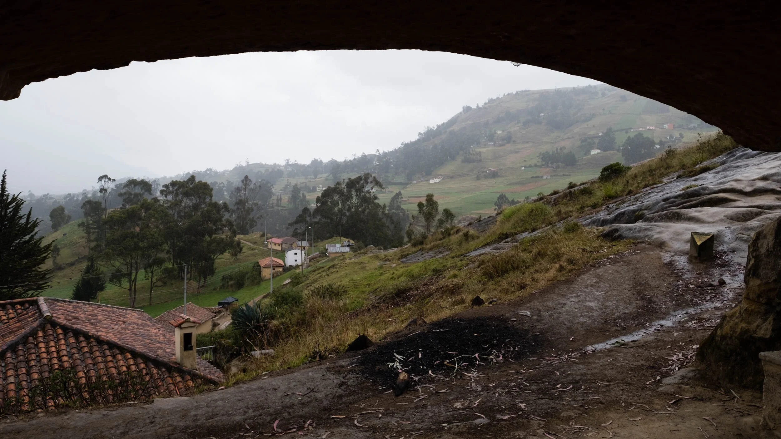 misty-valley-framed-by-stone-arch-andes-ecuador.jpg