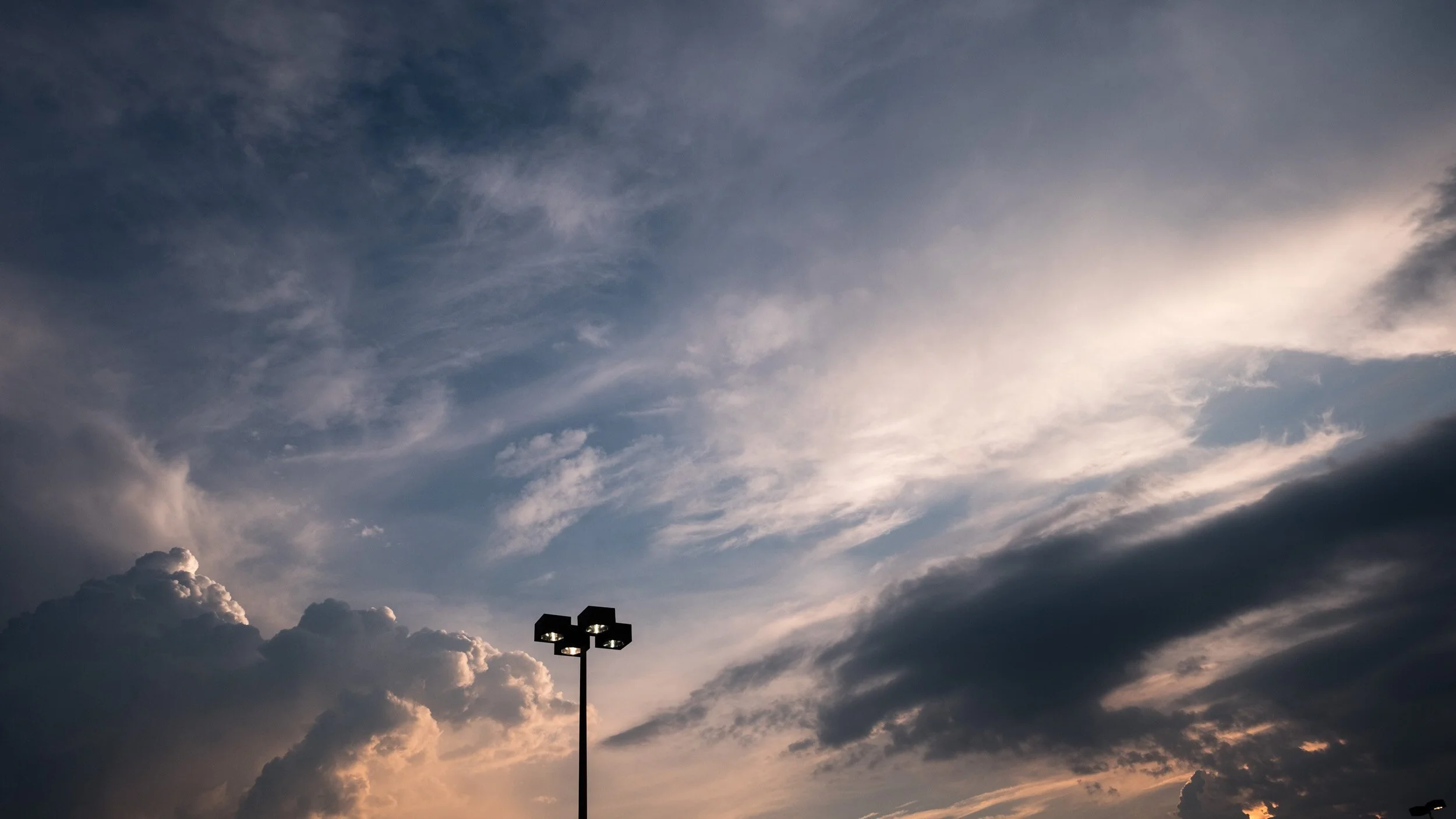 dramatic-sky-light-pole-silhouette.jpg