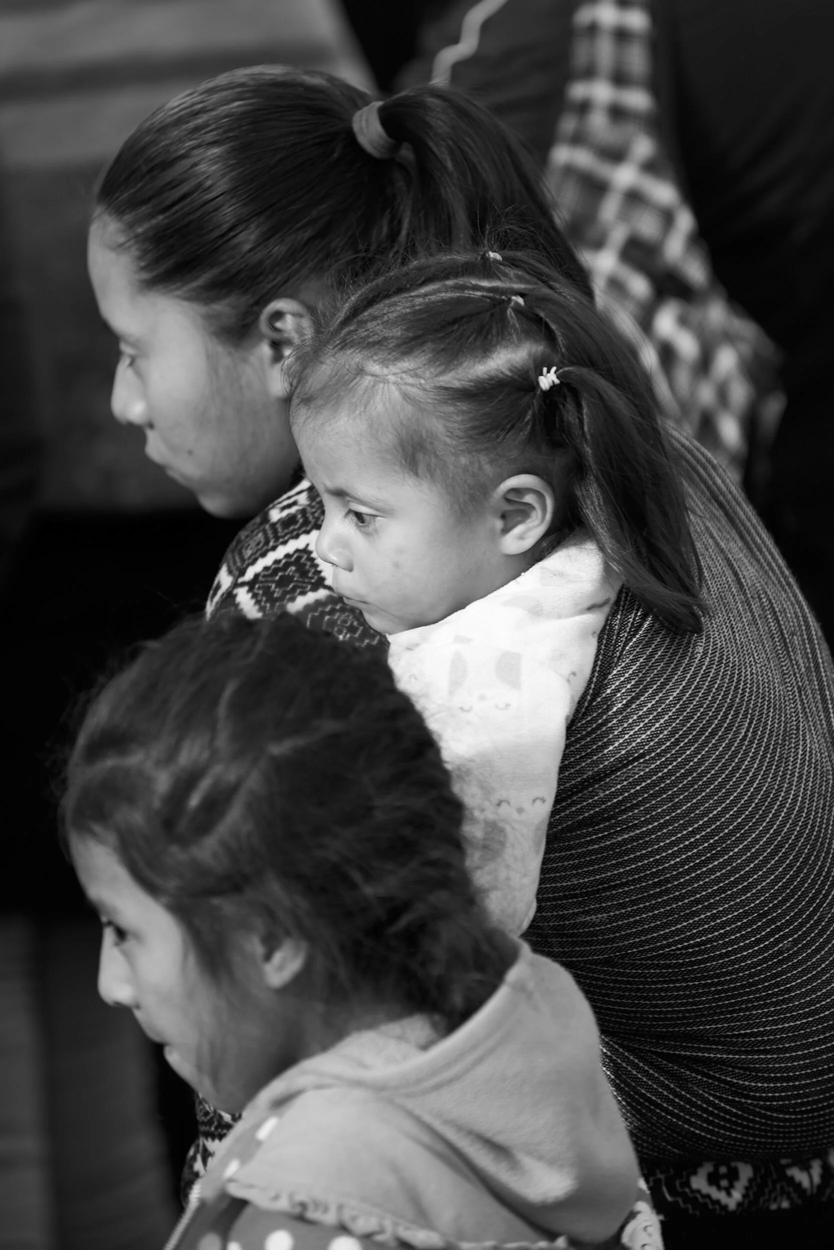 woman-with-two-girls-caravan-crowd.jpg
