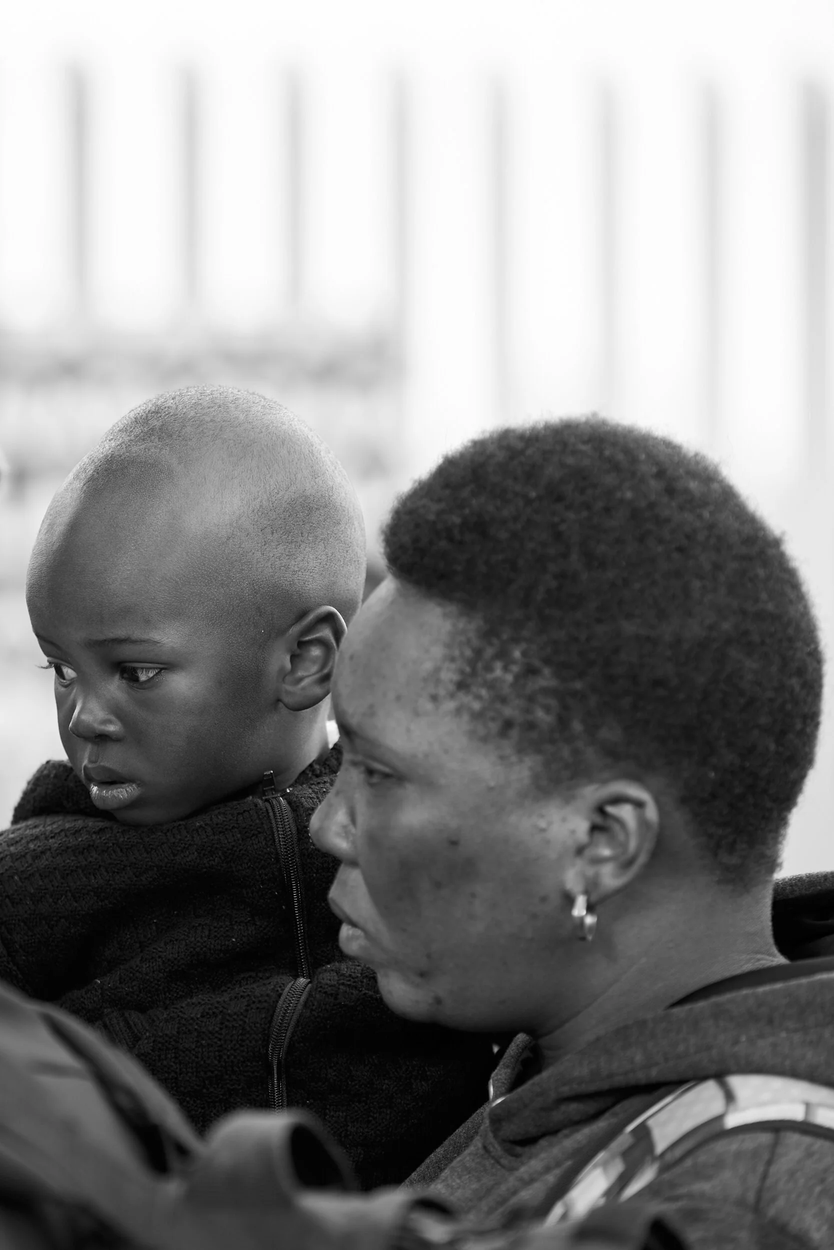 migrant-woman-and-child-close-together.jpg