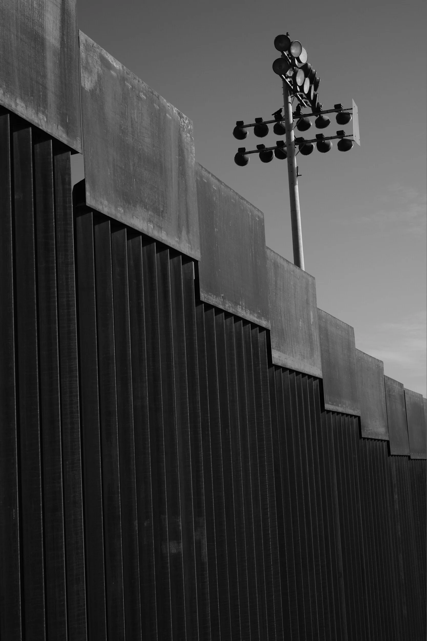 border-wall-stadium-lights-sky.jpg