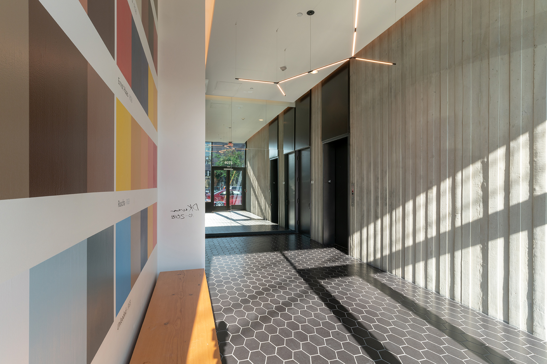 The lobby of the Silica building featuring William / Kaven Architecture partner Daniel Kaven’s mural, Architecture of Normal — William Kaven Architecture