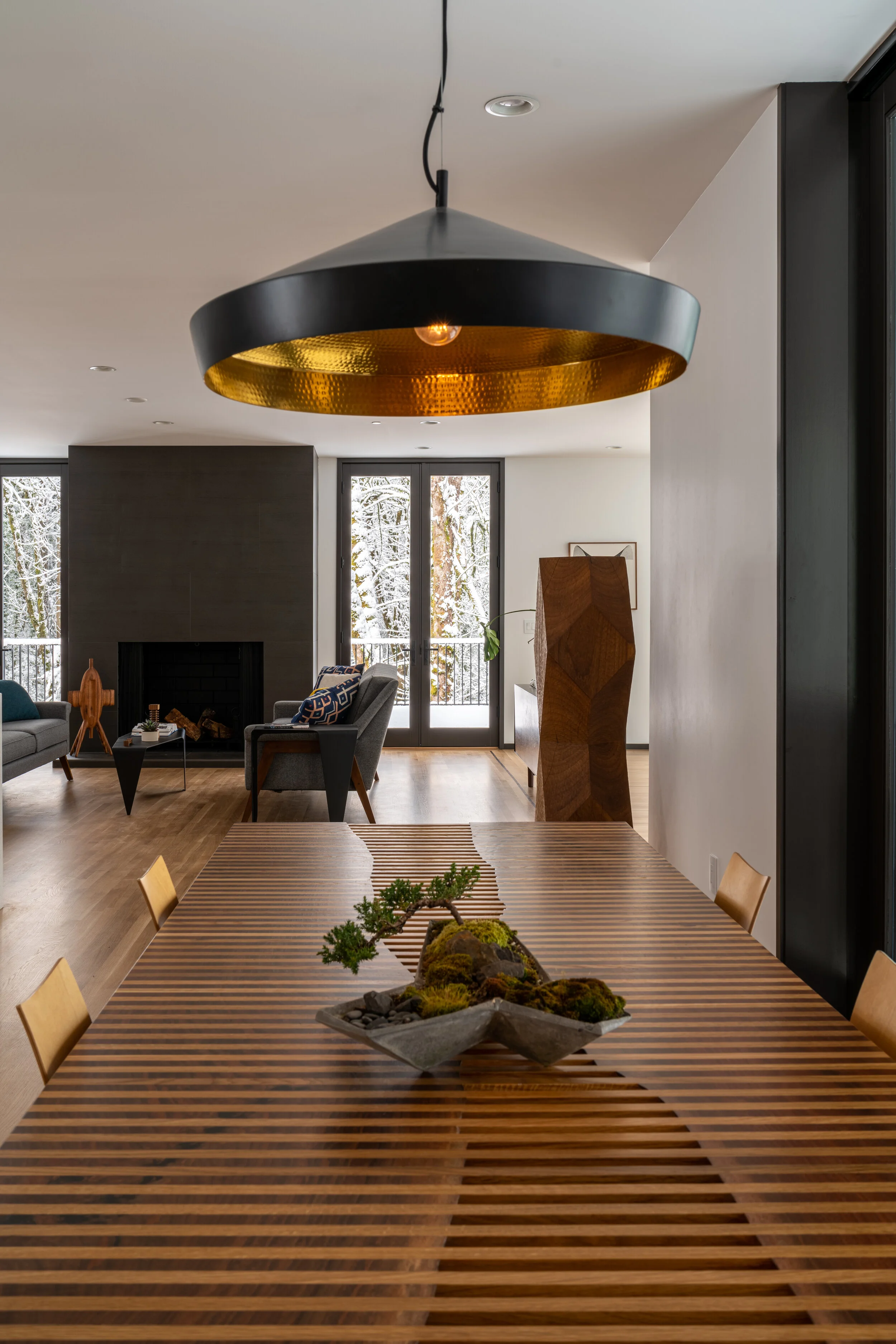 Dining room table with Tom Dixon chandelier — William Kaven Architecture