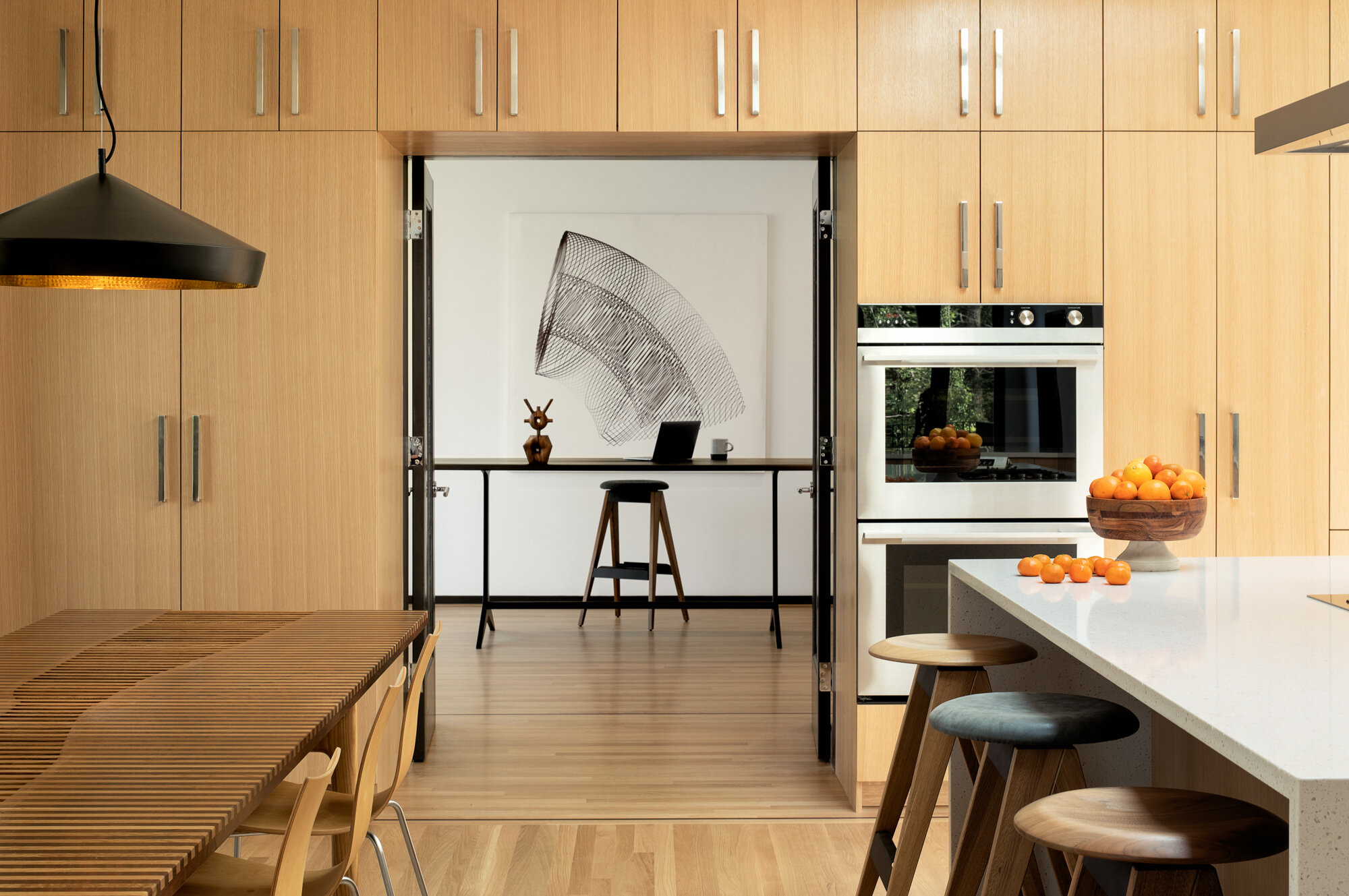View of study from kitchen in modern house — William Kaven Architecture