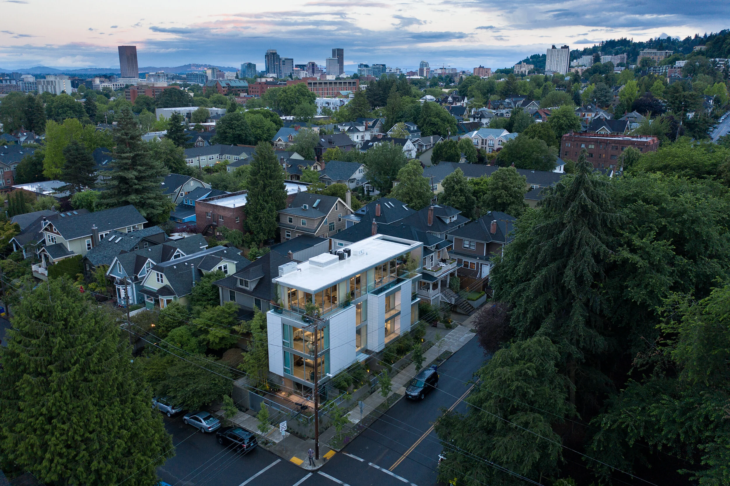 Aerial drone view of white modern house in Portland, Oregon — William Kaven Architecture