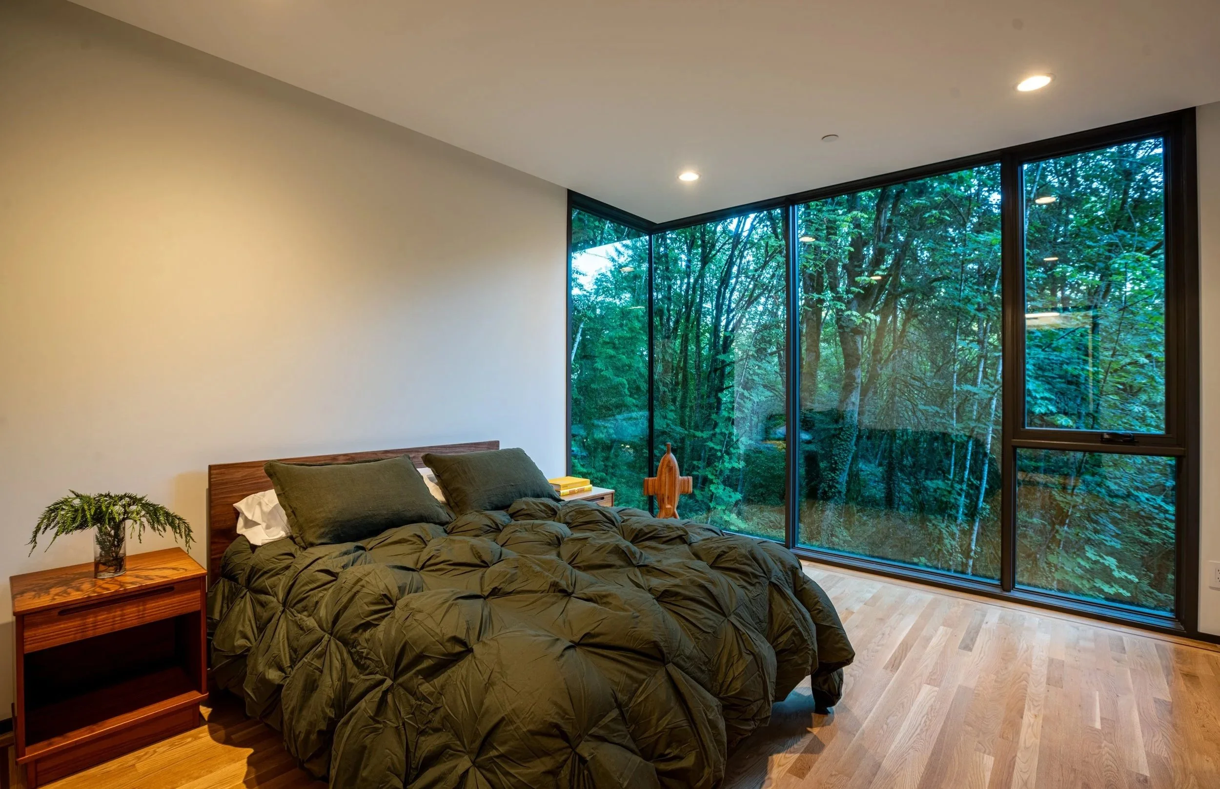 Bedroom with view of forest — William Kaven Architecture
