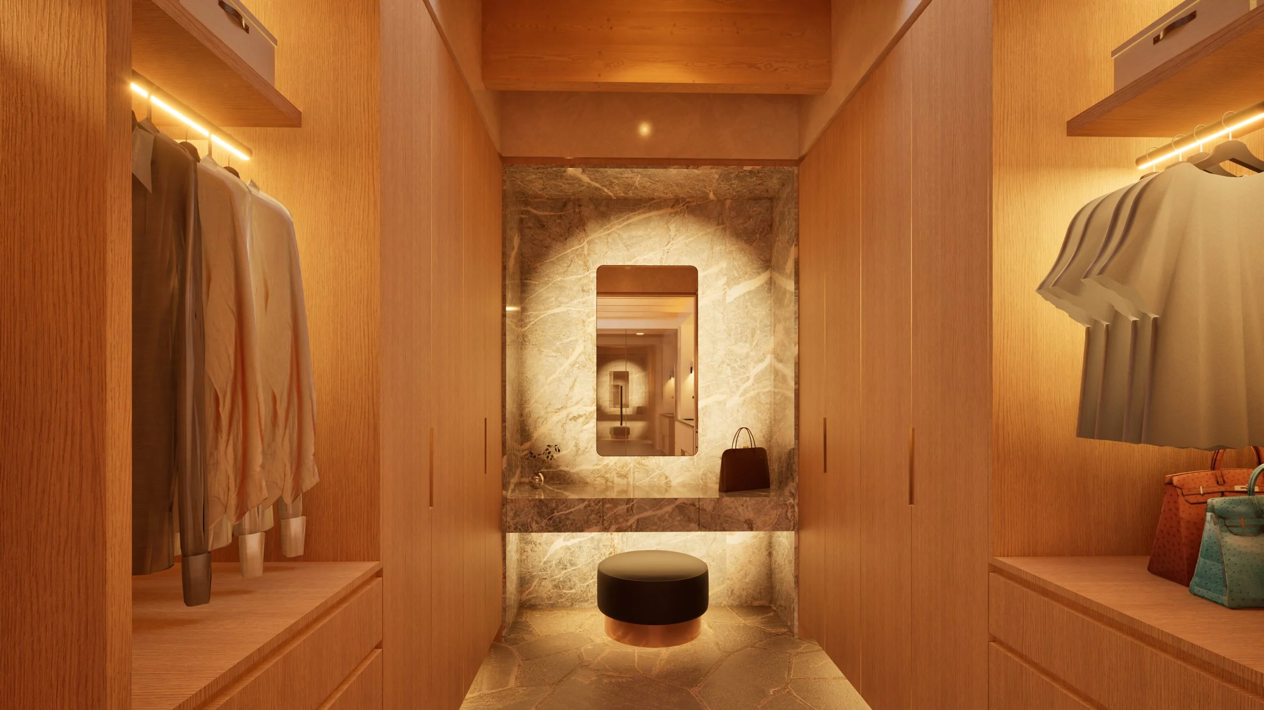 Primary closet with white oak cabinetry and vanity with marble surround — William Kaven Architecture.