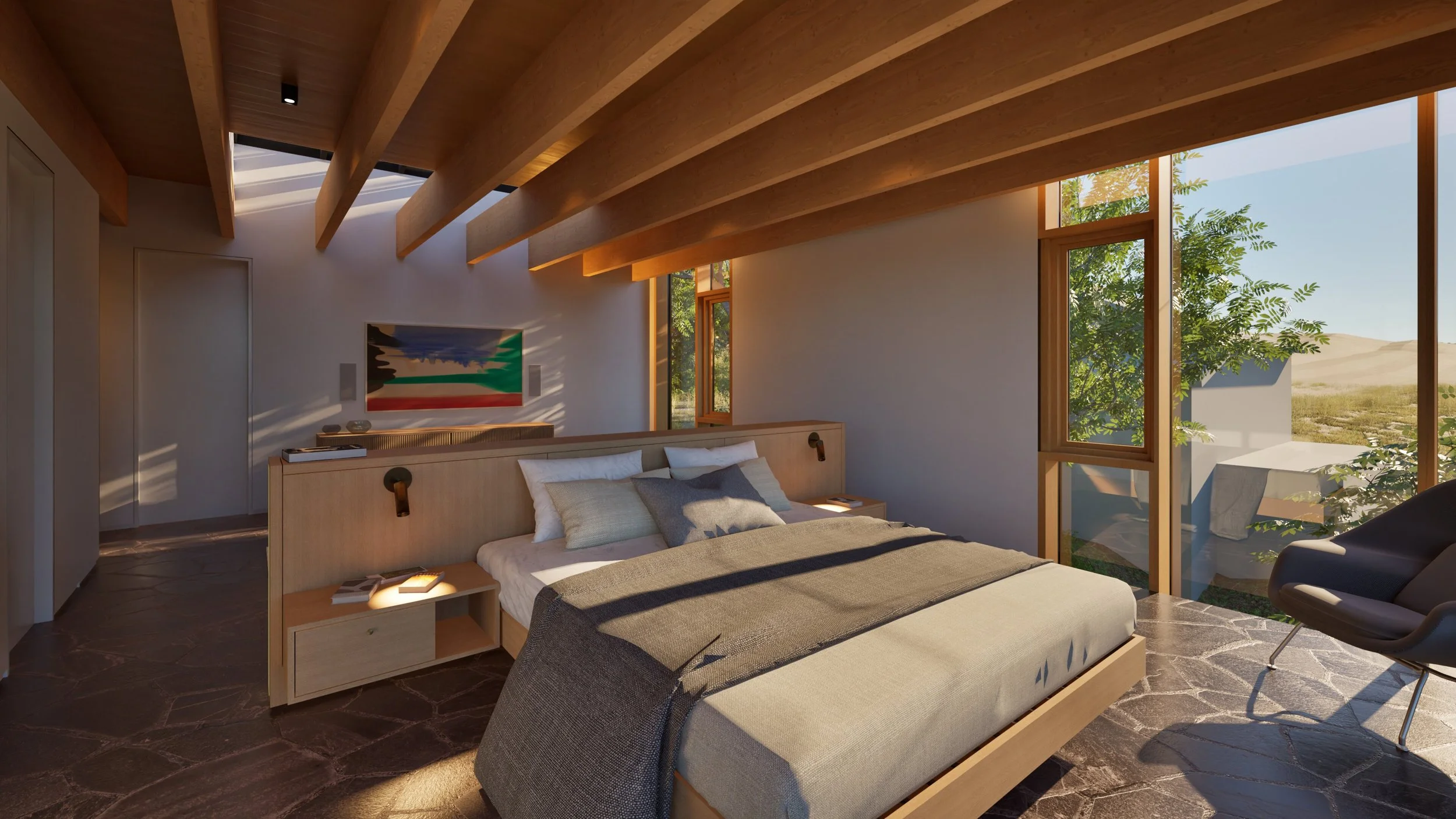 Primary bedroom with stone floor — William Kaven Architecture.