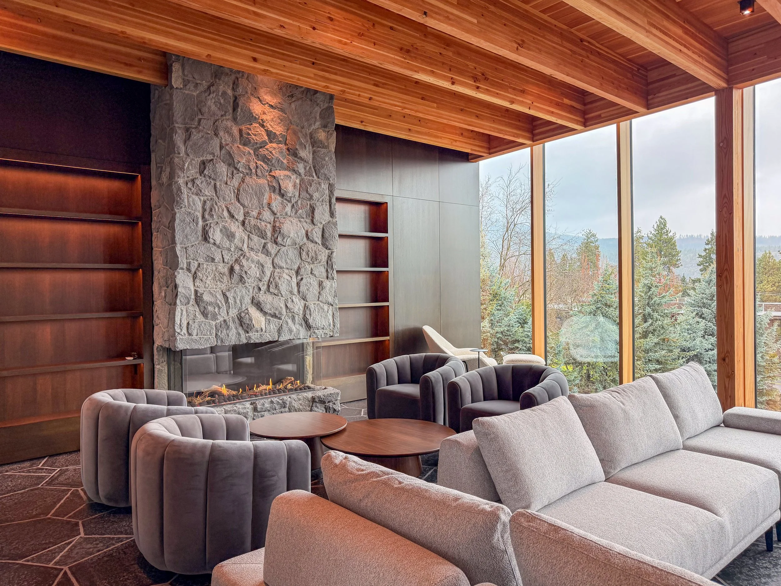 Living room and fireplace area at Hood River Residence, designed by William / Kaven Architecture.
