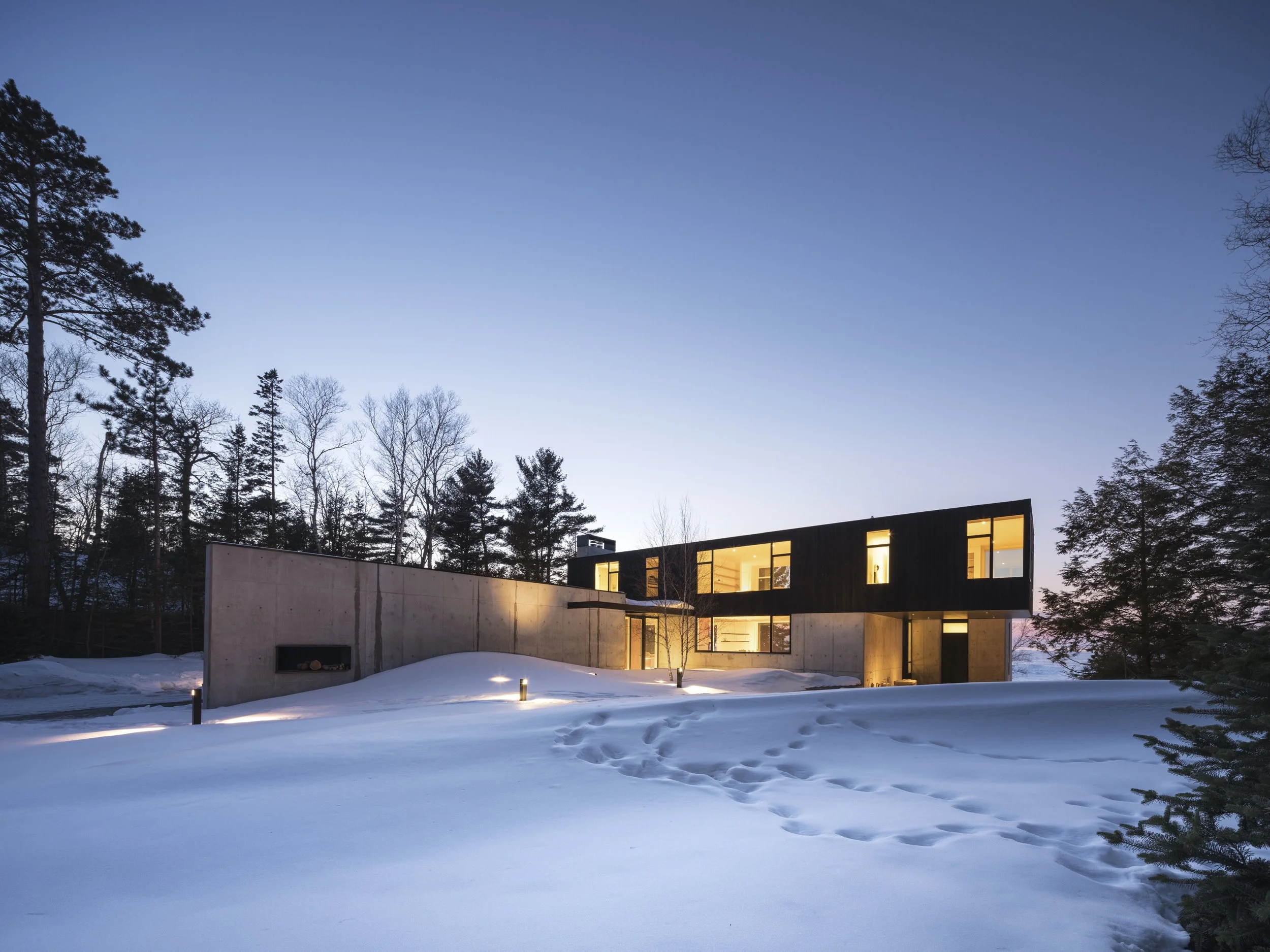 Modern Michigan home in snow — William Kaven Architecture