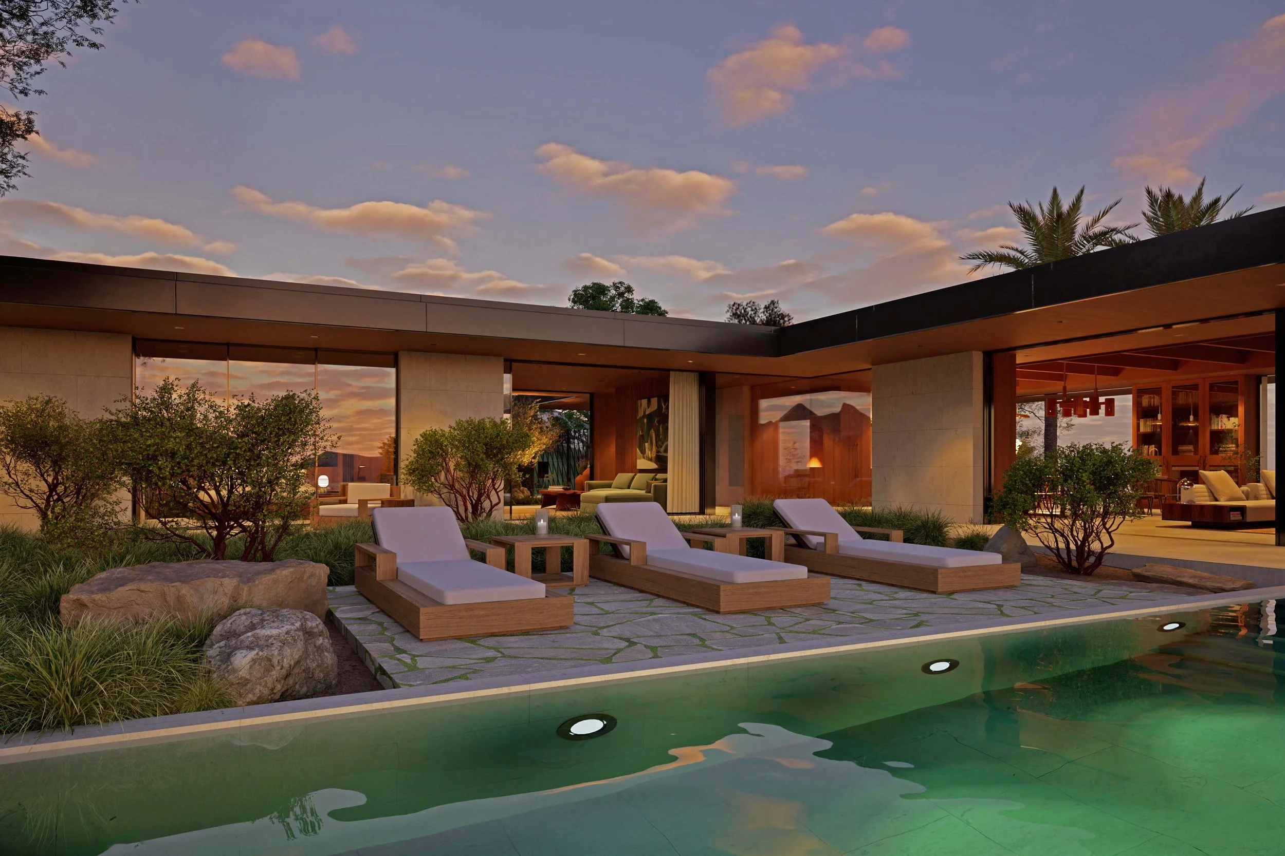 Stone terrace of modern home with lounge chairs and pool — Miramar residence by William Kaven Architecture