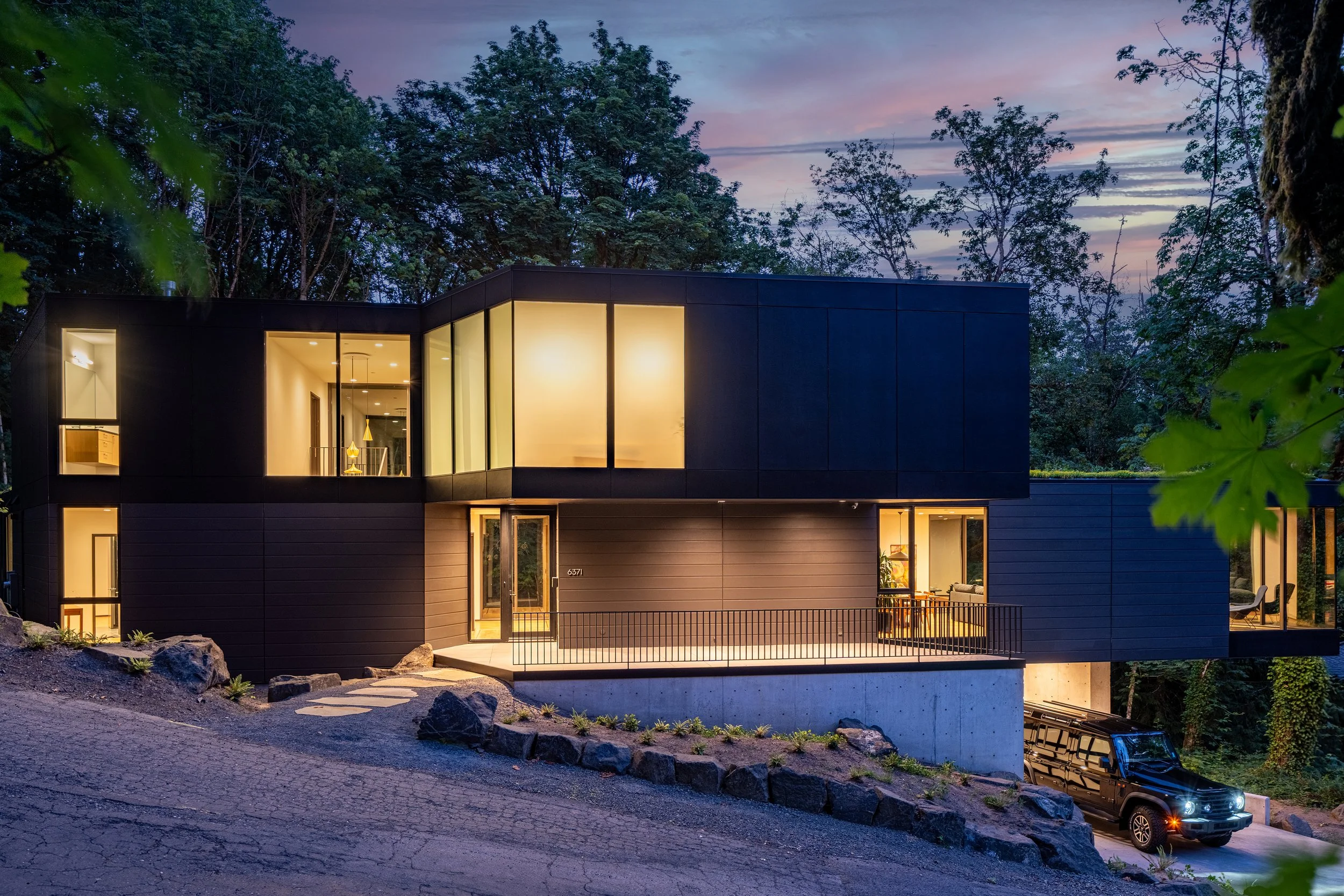 Modern black house in forest — William Kaven Architecture