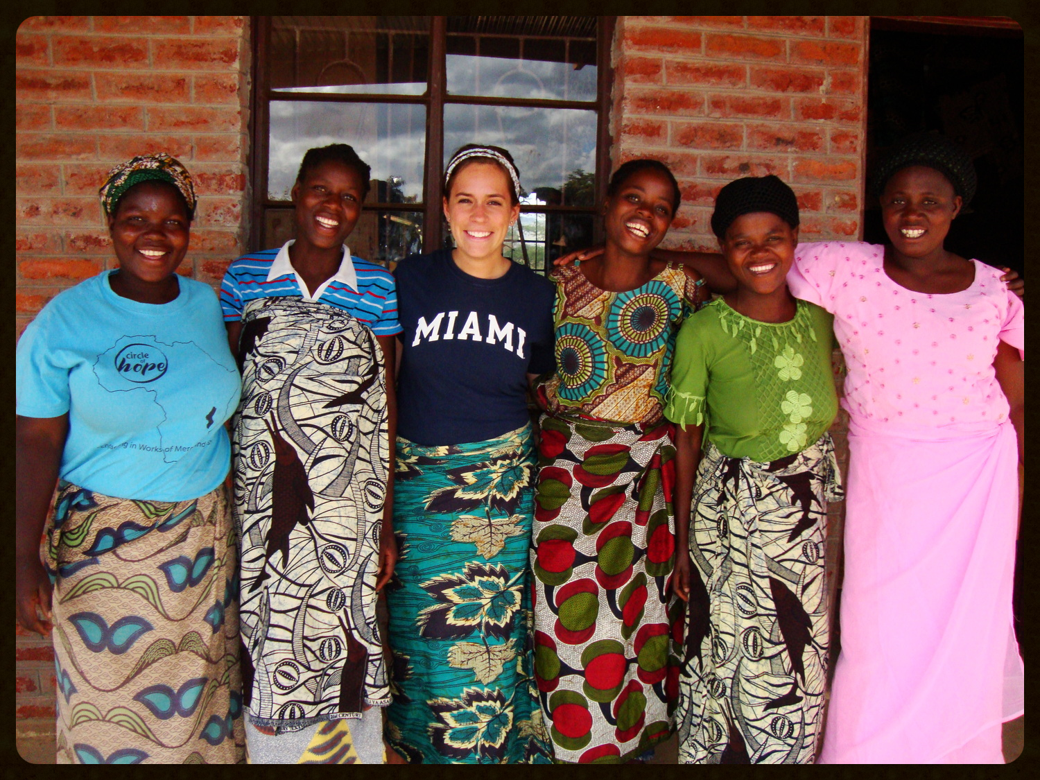 Kayla with the women who worked at the Hands of Grace Textile Center. 