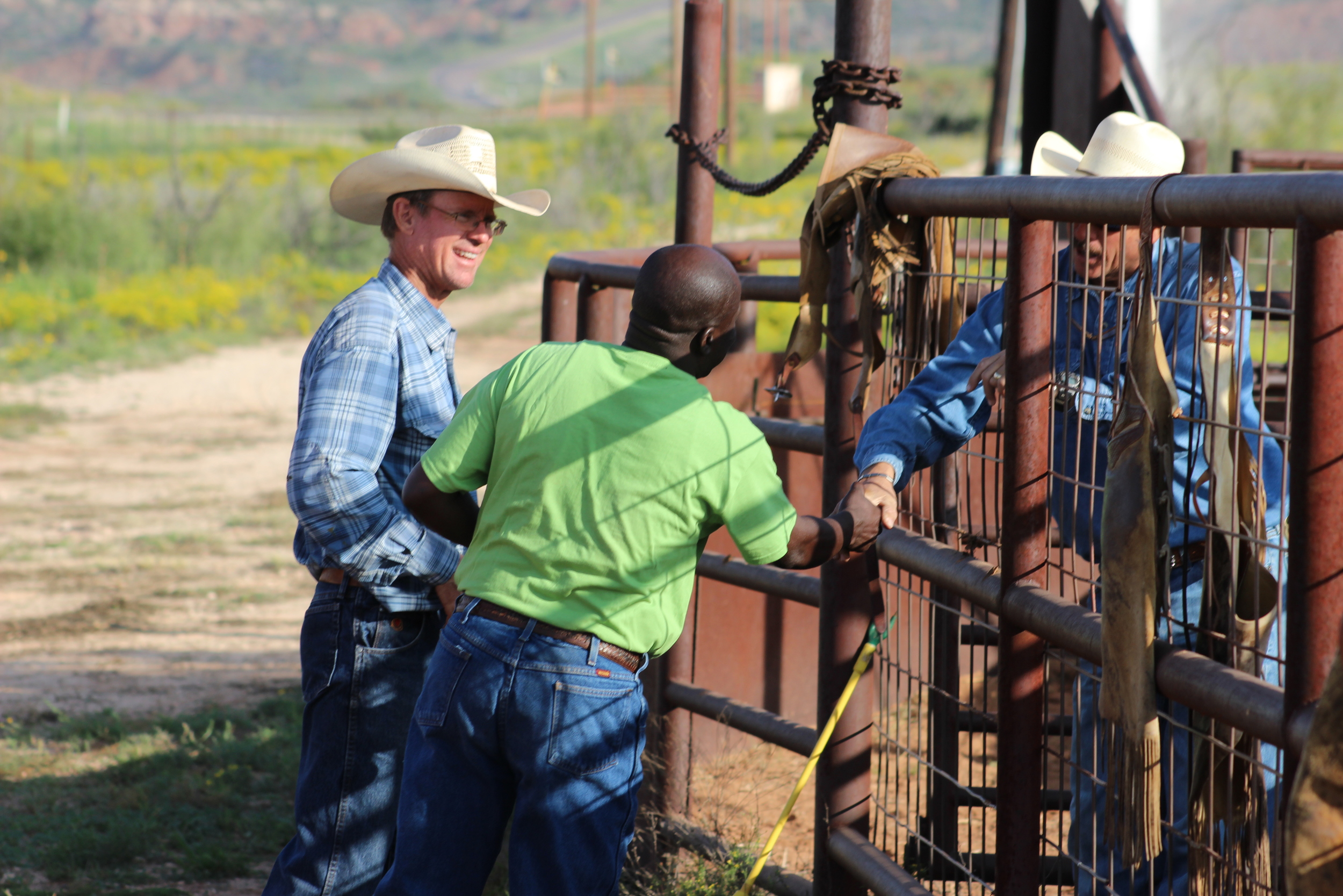 Drew showing Pastor Phiri around his ranch in Post, Texas. 