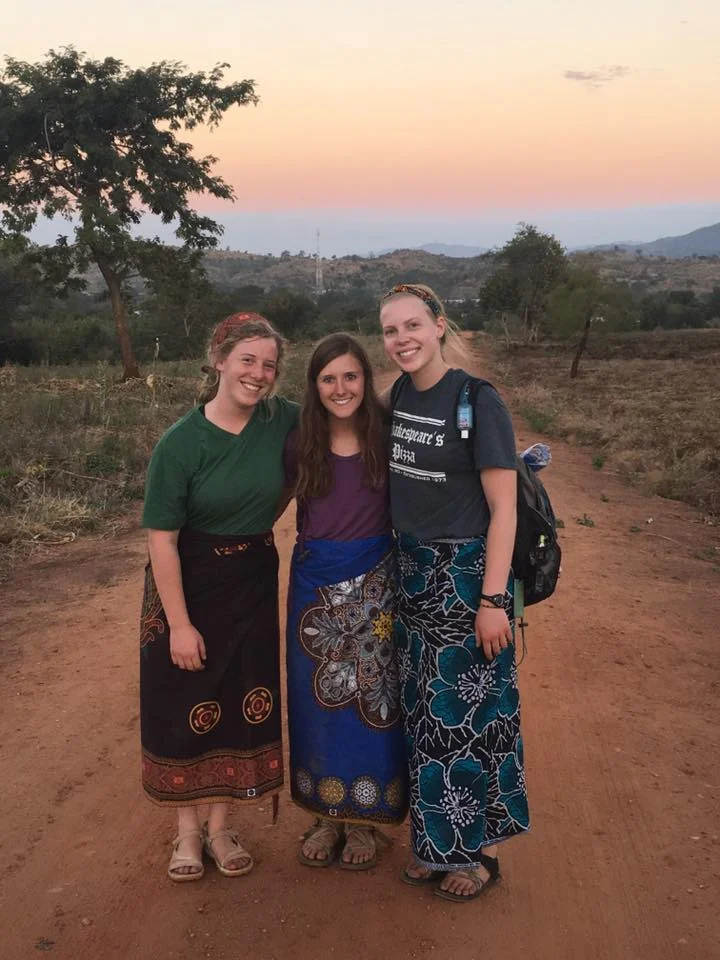 Anna Williamson, Shae Jansen and Anna Stock (author) pictured left to right. The famous "chitenje" mentioned throughout Anna's diary is the wrap around cloth the girls are wearing for skirts.