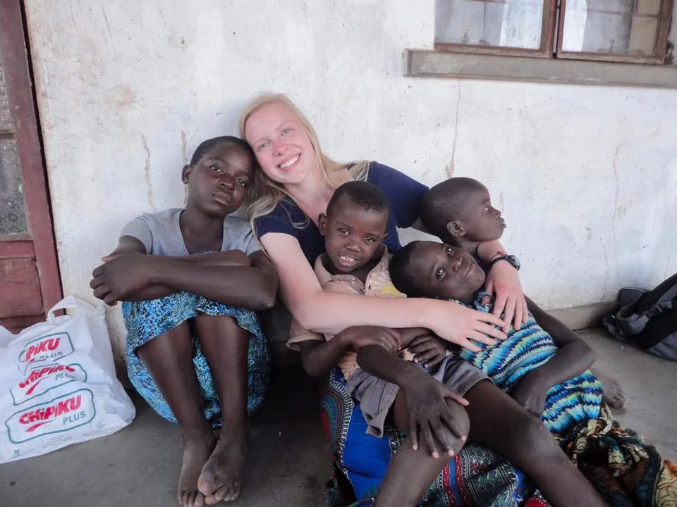 Anna with her lap full of precious children! Dolini, Anna, Clever, Eunice and Evasi