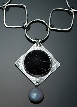 etched black agate in silver with pearl