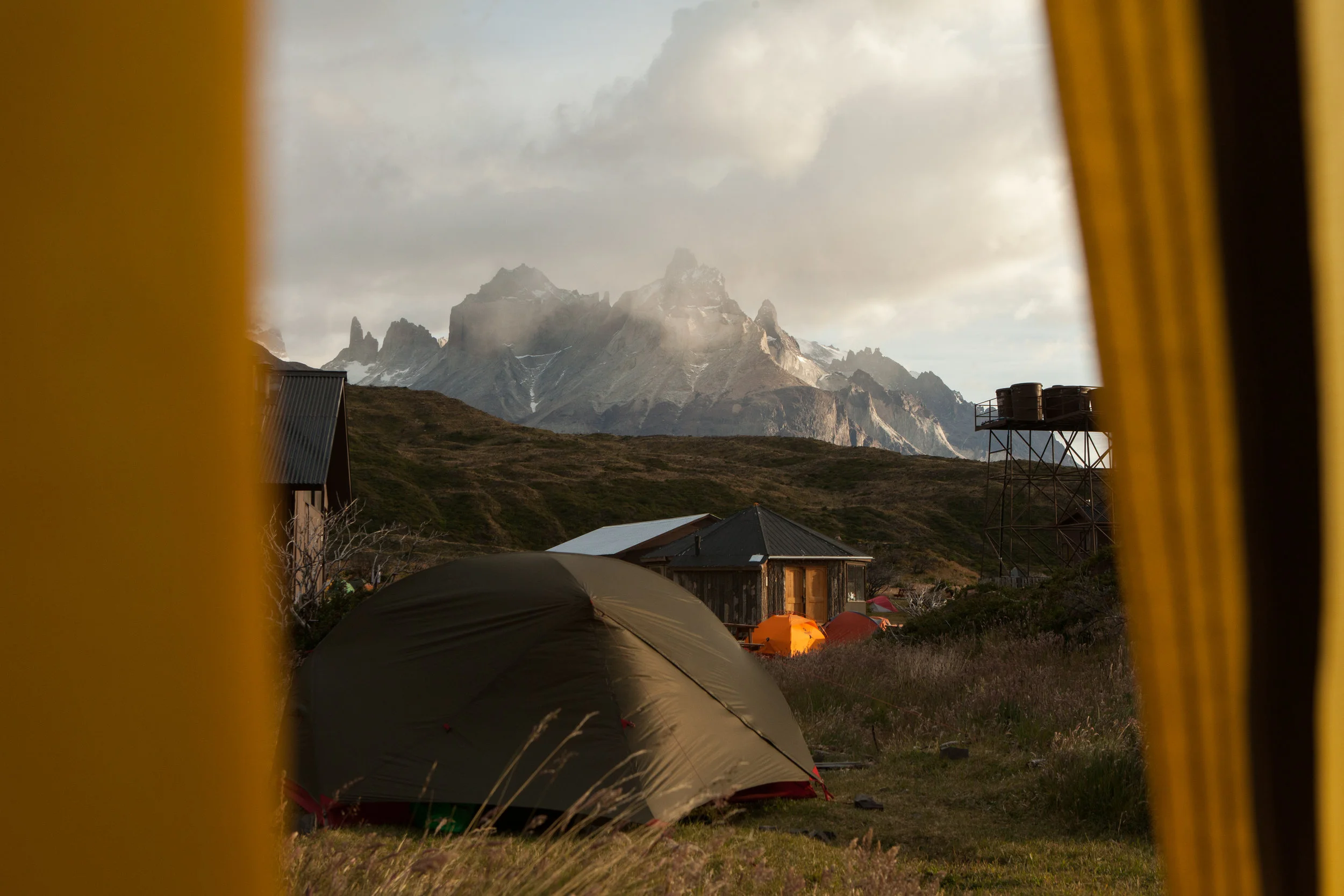 The view from my tent as the rain breaks. Cuernos del Paine. 