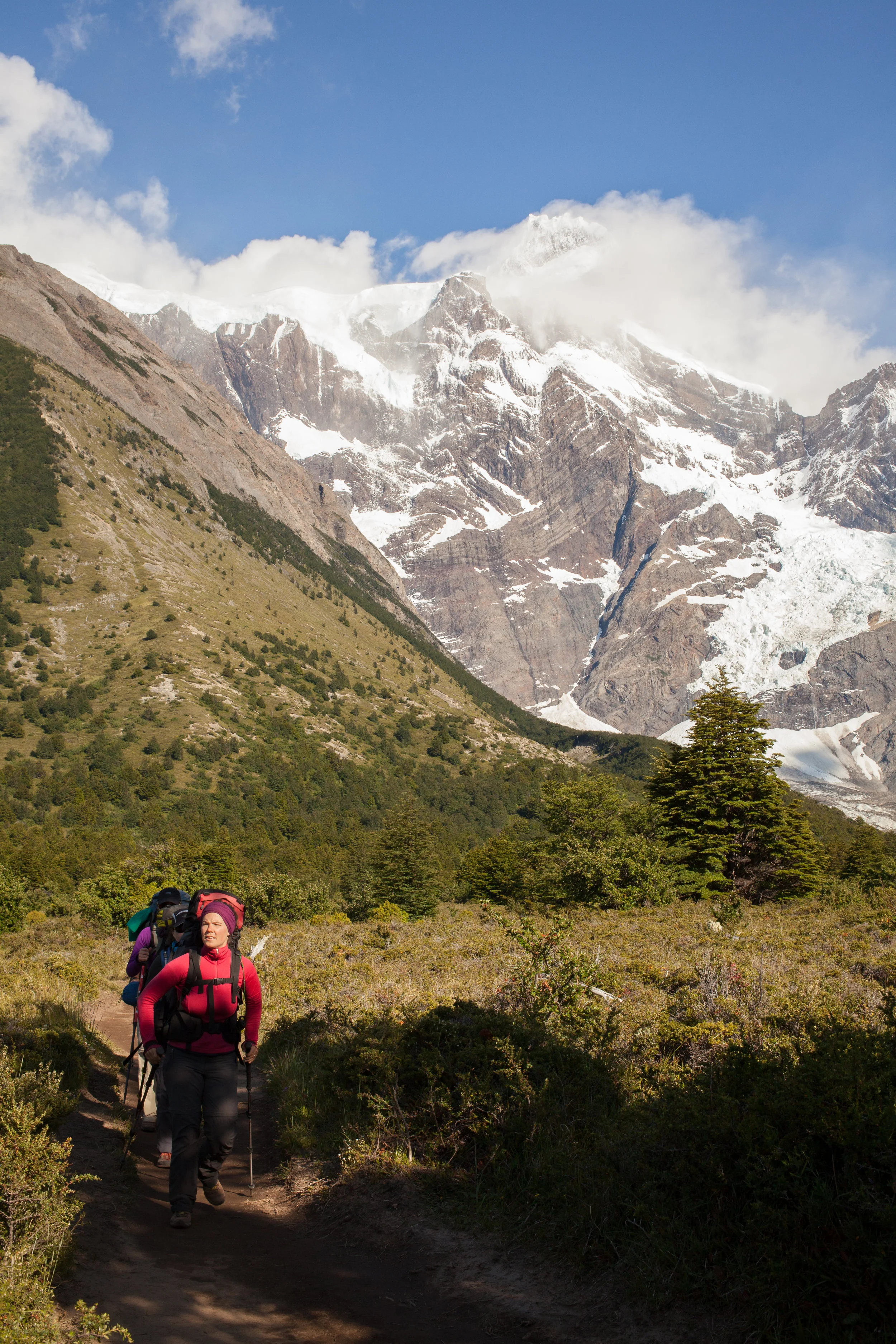 Callie leads the way from Italian Camp with the Franc és Glacier in the background. 