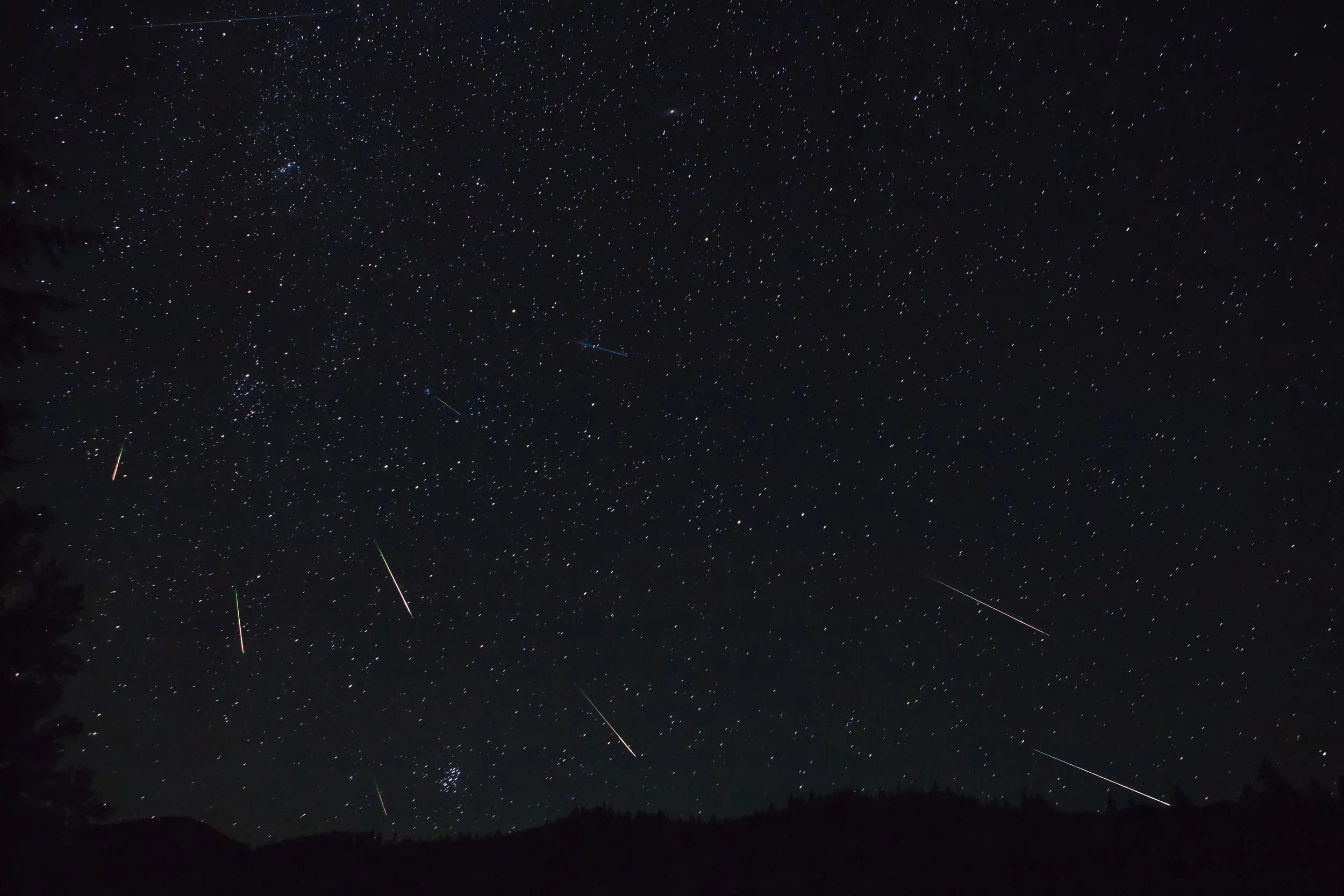 Perseid Meteor Shower. Okanogan-Wenatchee National Forest, Washington. This picture is a photo composition of multiple images captured between Thursday, August 11 from 11:57pm - Friday, 12th 1:28am. The images have been oriented to reflect the initial composition of star alignment. 