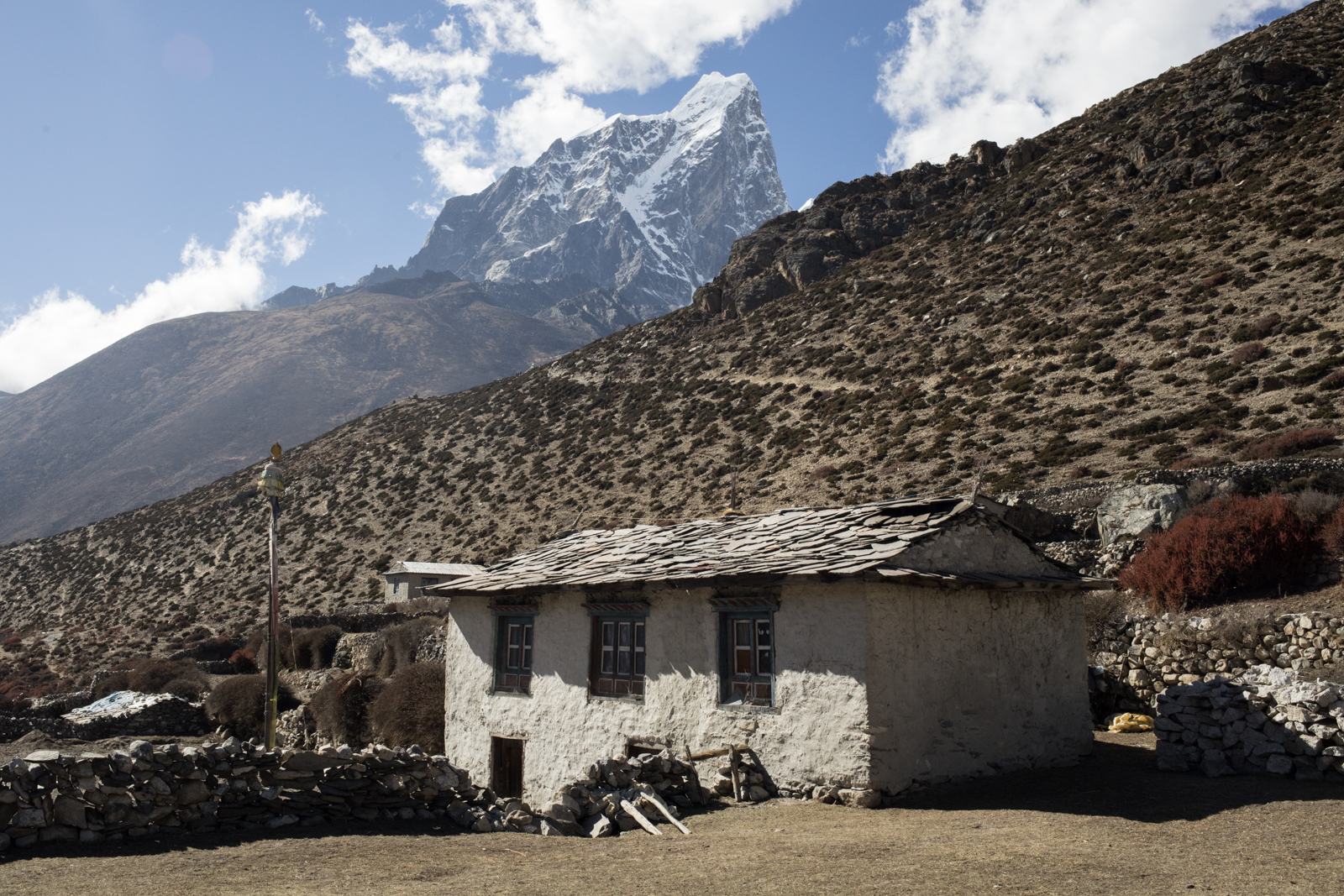 Taboche 6,495 m / 21,309 ft. The village of Dingboche which sits at an elevation of 14,410 ft. We took a rest day to acclimatize to the elevation gain and the altitude. I was beginning to feel some effects of altitude, a slight headache, and a little nausea. I made sure to rest a lot during our stay at Dingboche. Rest, hydration, repeat. 