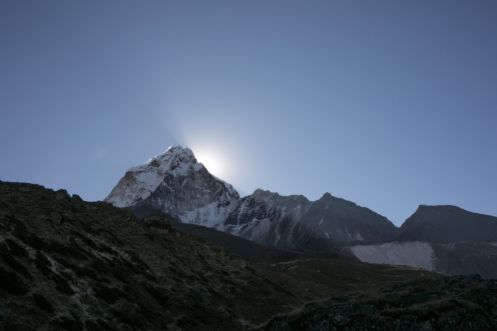 The trek home. While in Loboche I began showing signs of being impacted by the altitude. I had woken up around 3am with the worst headache of my life. I was nauseous. I knew right away that I would not be hiking farther. I cried. The rest of my group continued up to Kalapatthar and to the Everest Base Camp. I stayed in Loboche and began taking Diamox. I had hoped I would get better. I tested my oxygen level and it was steady around 74. The lowest dip it took was to 65. Not a good sign. I met one of our porters and began the trek down the valley. The best way to treat altitude sickness is to go down. We walked slowly. My headache persisted for a while but began to reduce quickly as we approached Pheriche. Later that day, I met Russ and Ambrose as they returned from their trip to Kalapatthar. I was feeling better. 