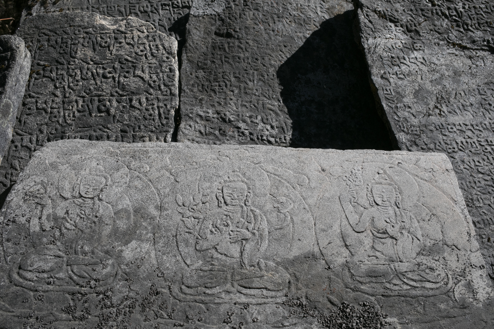Stone carvings. Mani stones. 