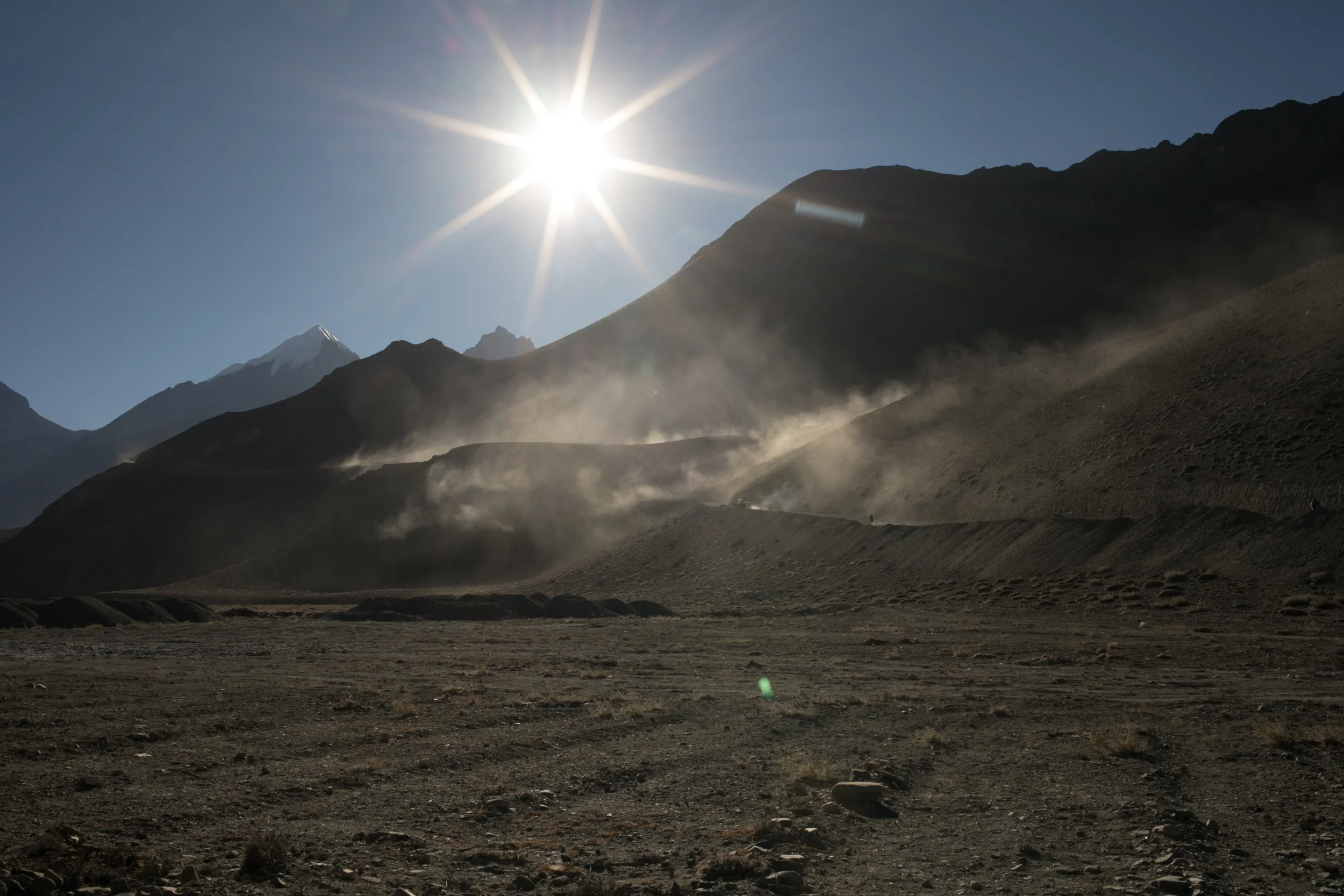 Dust hangs in the air and swirls as the jeeps, buses and motorcycles pass by. We pulled our scarves over our noses and look down towards the ground to protect our eyes. This road is busy. The road to Muktinath is part of the Annapurna circuit and was one of the busiest sections of the trip. 