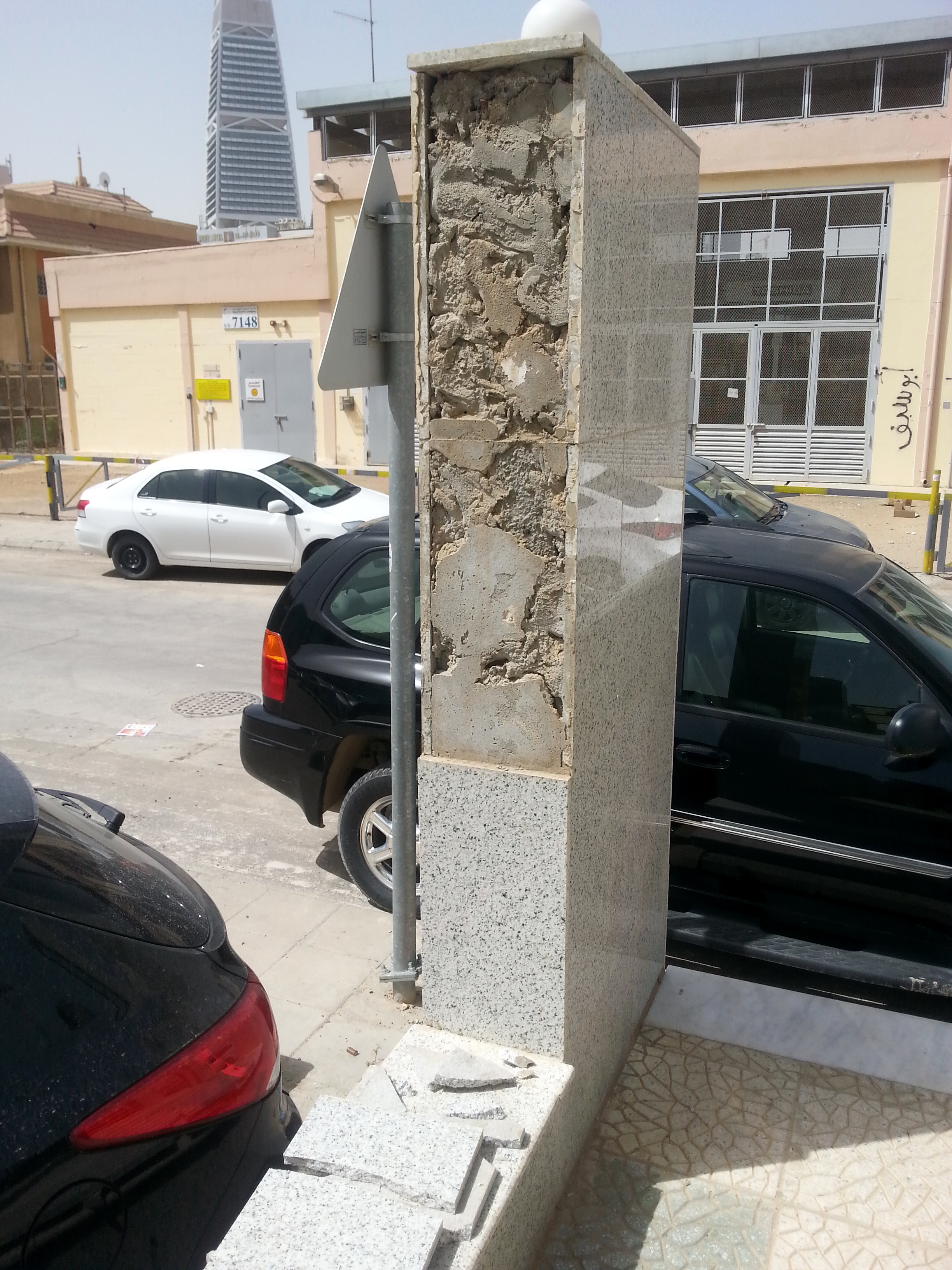 Marble slabs sloughing off the concrete structure