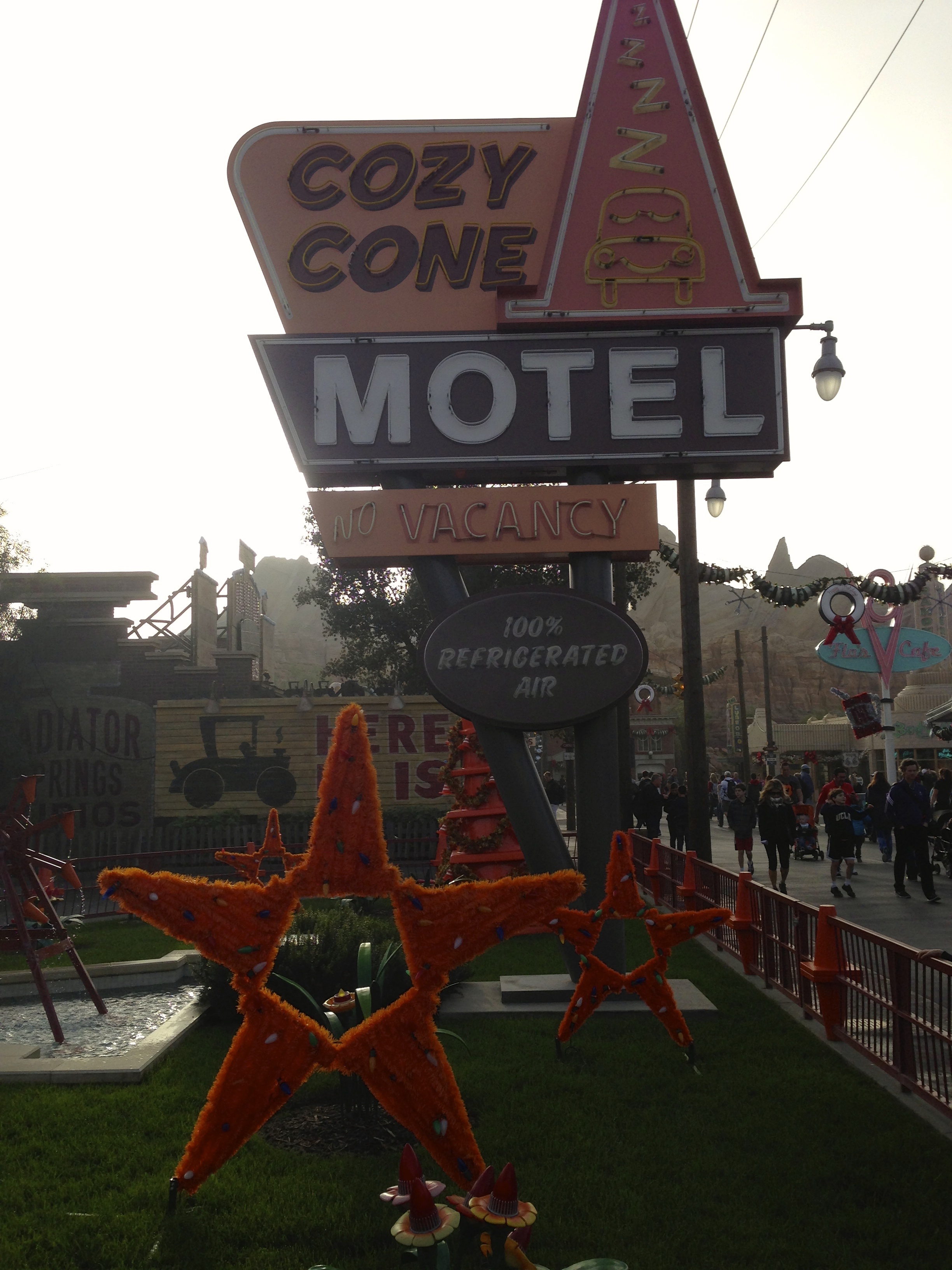  I especially love the traffic cone water wheel off to the left. This entire section has loads of creative uses for traffic cones as decor and I can't believe that Disney isn't selling them in the gift shops! 