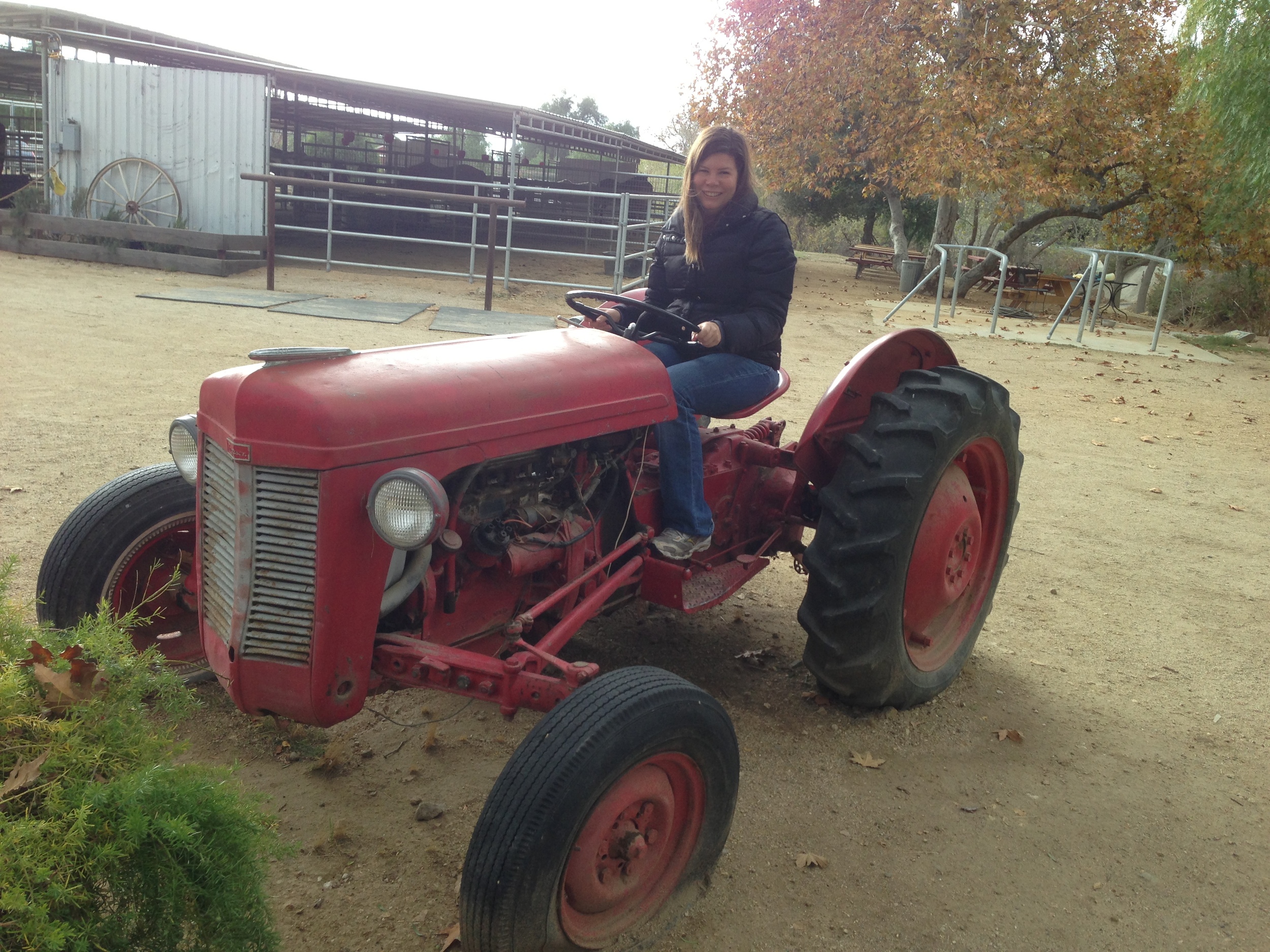  The last time that we visited, the tractor was &nbsp;over-run with kids. We jumped at the chance for a photo op. 