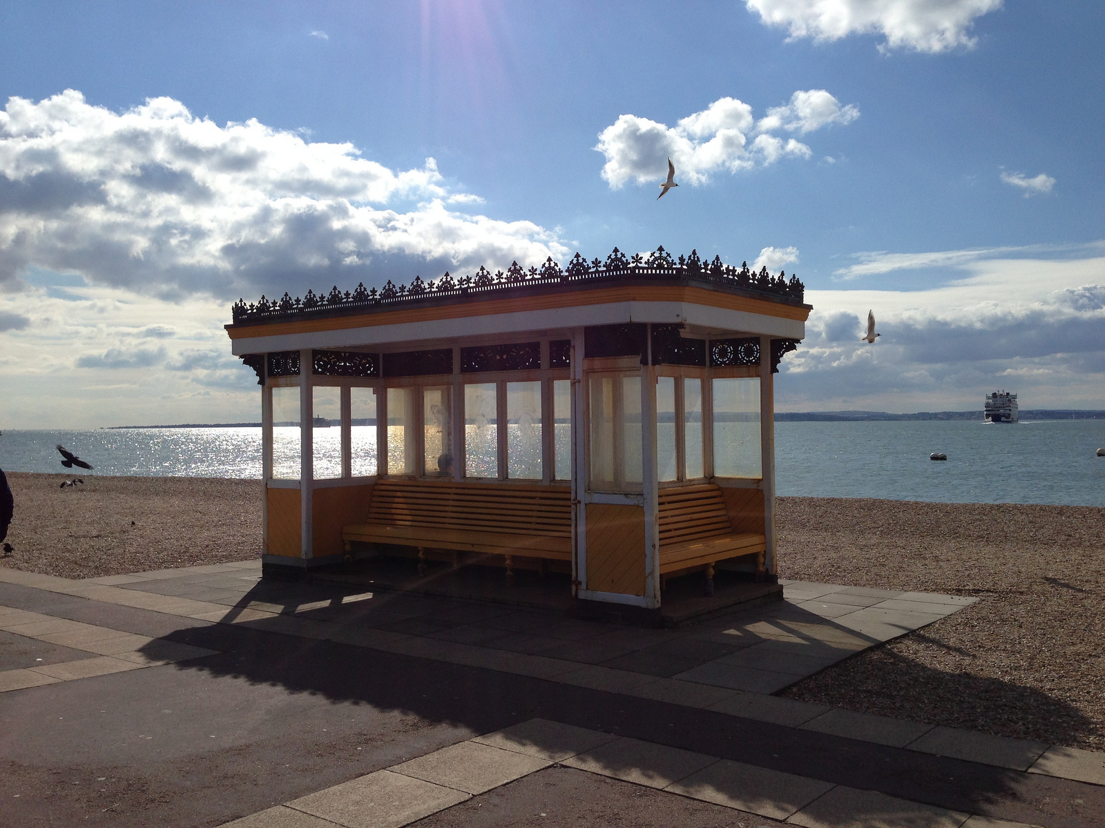  ​This covered bench looks likes it's straight out of the set of Boardwalk Empire. 